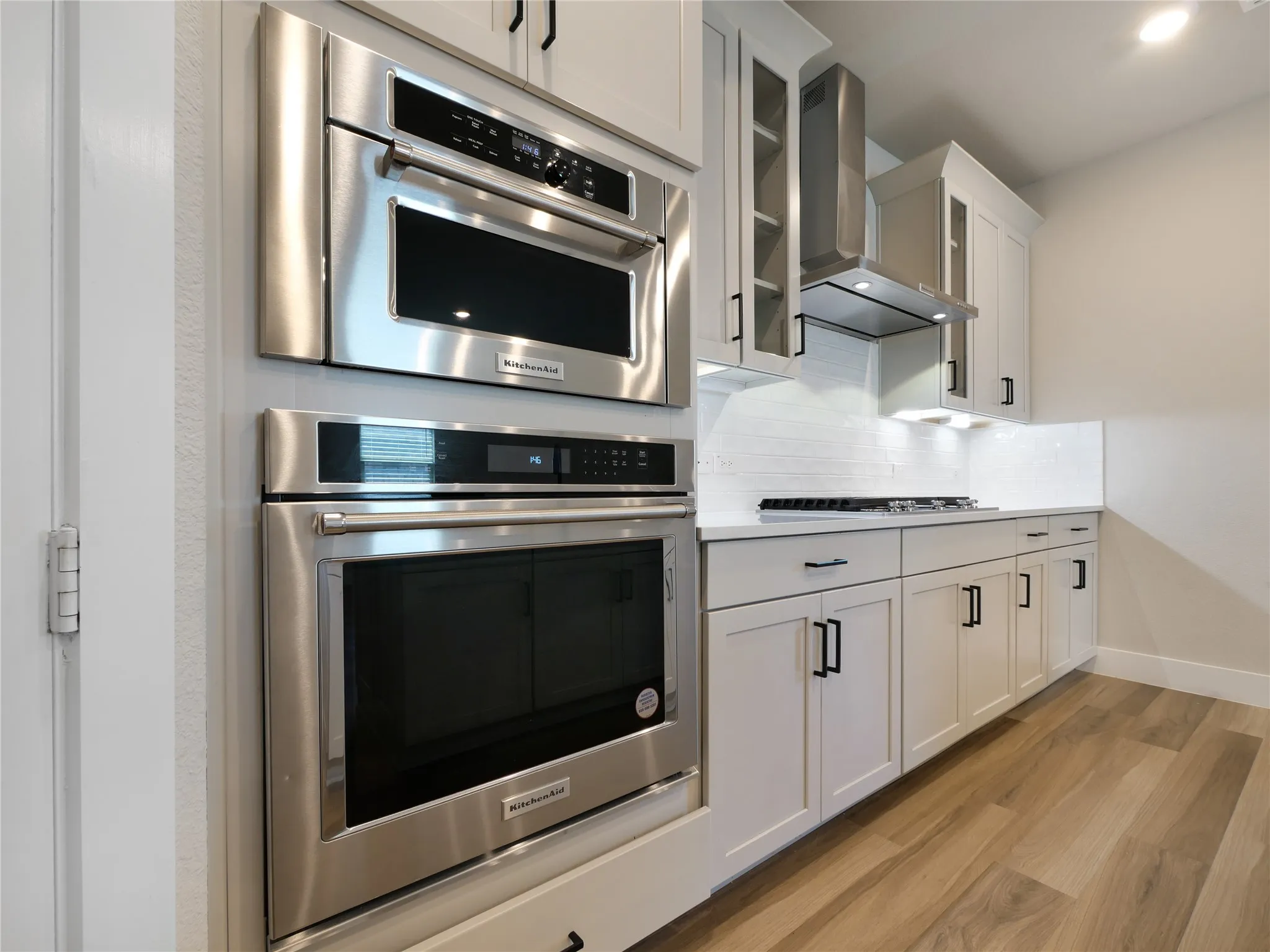 Built-in Kitchen Aid stainless steel appliances.