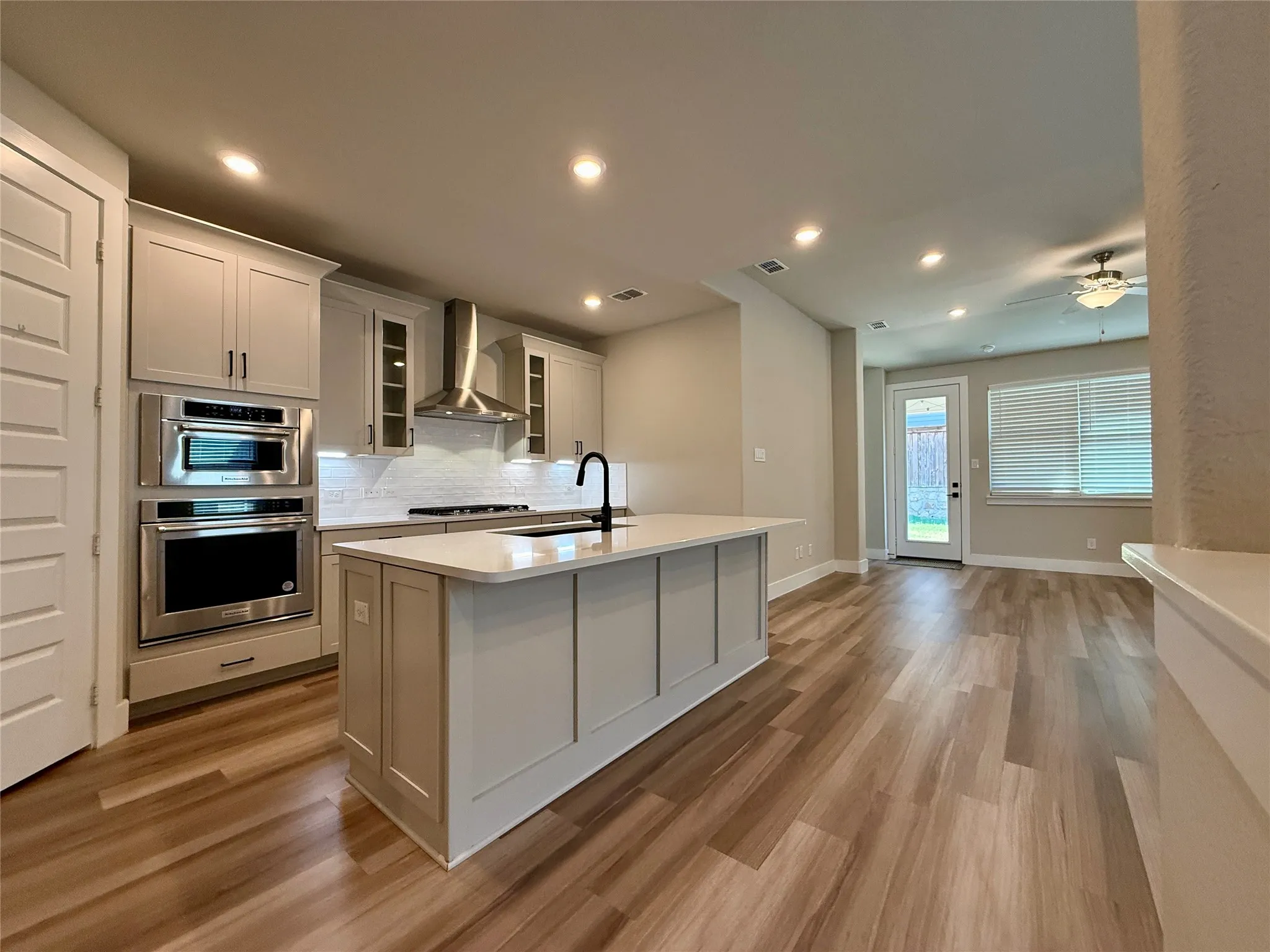 In this open concept floor plan the kitchen overlooks breakfast area and family room.