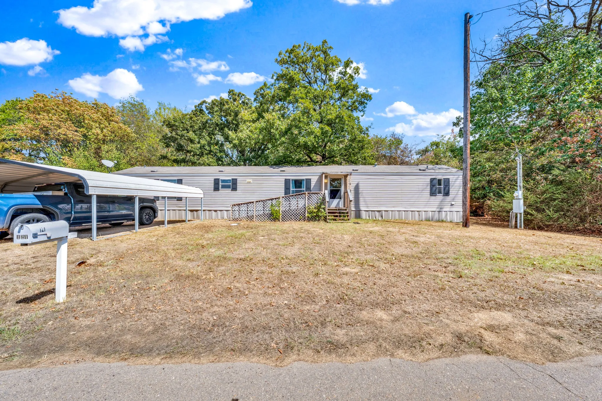 Manufactured Home For Sale in Rains County , 121 Rs County Road 3317, Emory, Texas 75440, 2 Bedroom, 2 Bathroom, Garage spaces, 1,216 Sqft, built in 2010, mls#21383260, Real Estate Agent in Emory, Homes For Sale in Rains county, Homes For Sale in Emory, Realtor in Emory Texas, Real Estate Brokerage Independent Realty Texas, Luminita Cordes Realtor