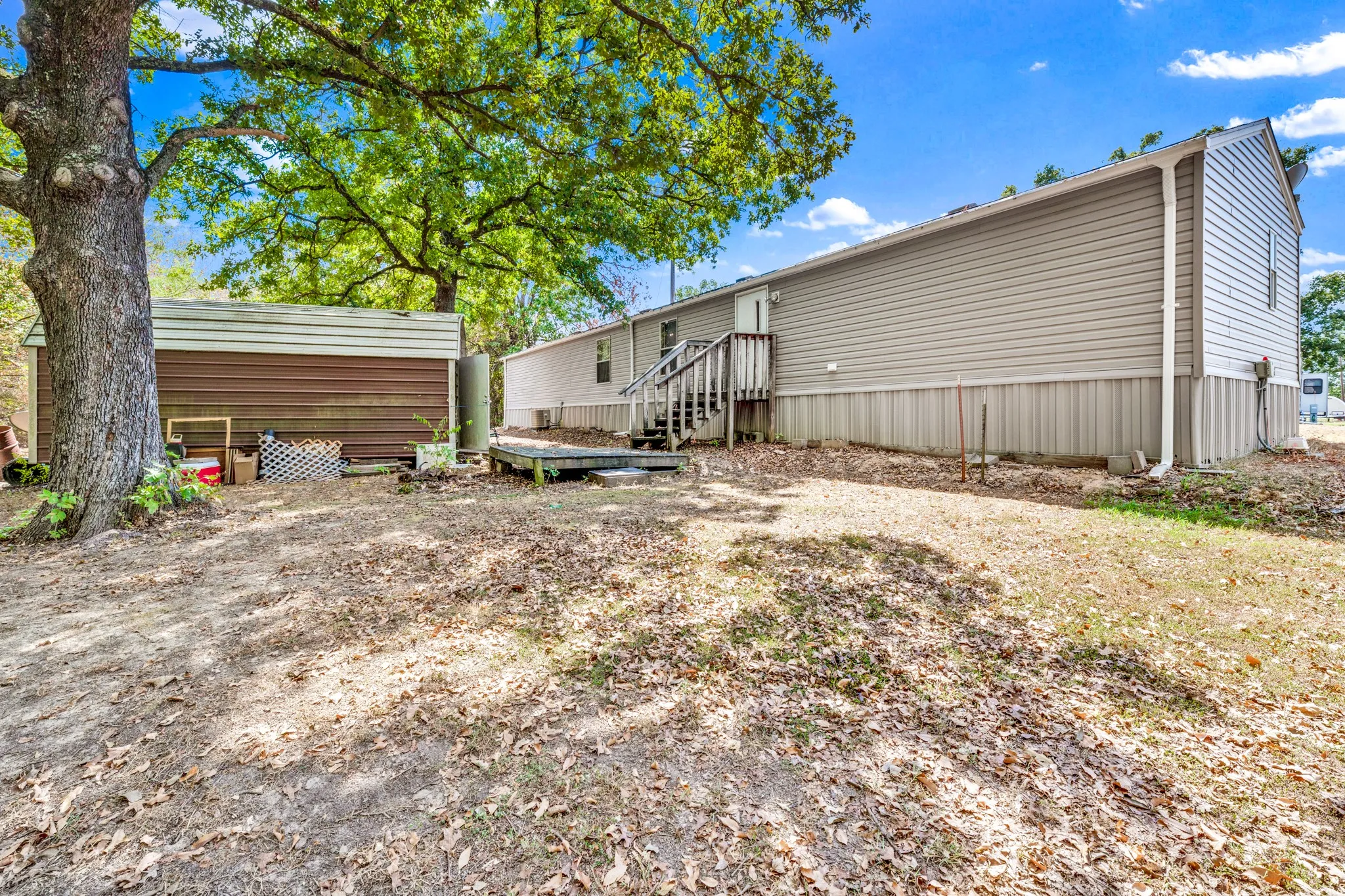 Manufactured Home For Sale in Rains County , 121 Rs County Road 3317, Emory, Texas 75440, 2 Bedroom, 2 Bathroom, Garage spaces, 1,216 Sqft, built in 2010, mls#21383260, Real Estate Agent in Emory, Homes For Sale in Rains county, Homes For Sale in Emory, Realtor in Emory Texas, Real Estate Brokerage Independent Realty Texas, Luminita Cordes Realtor