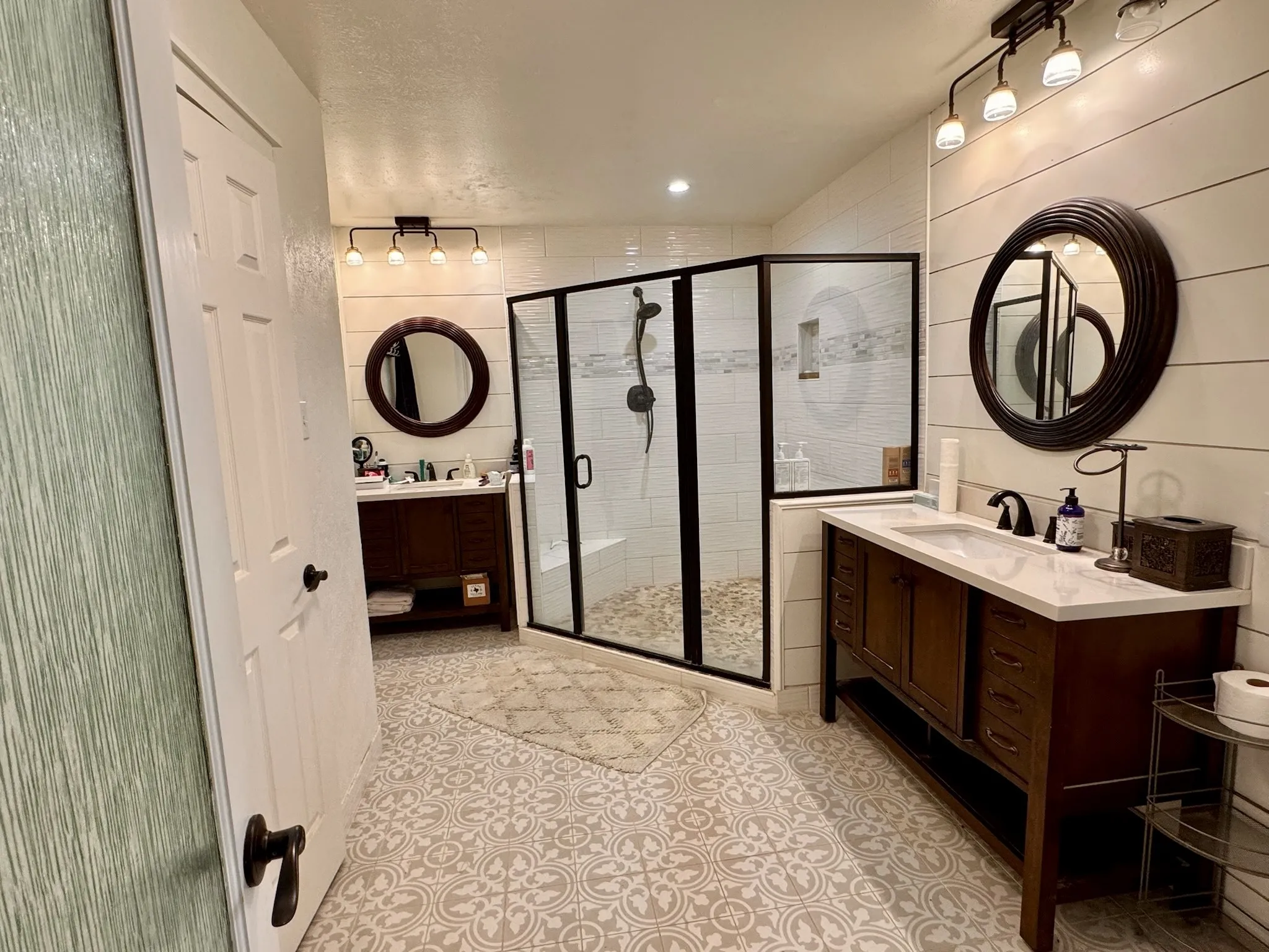 Large primary bathroom offers abundant space.