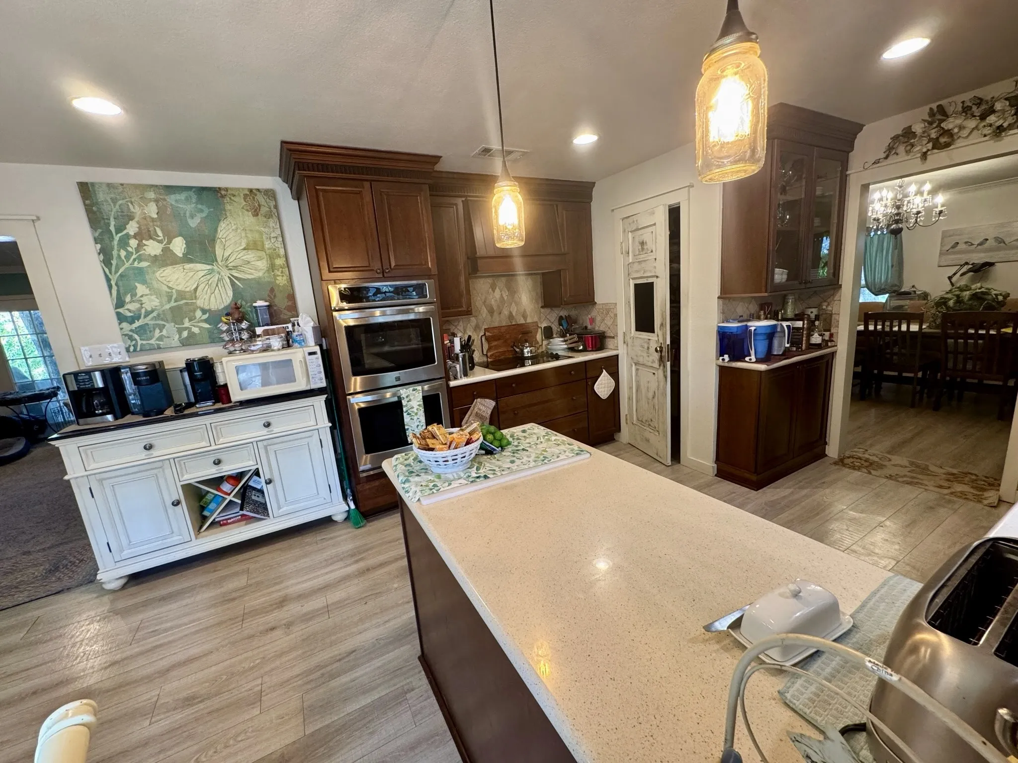 Counter space for preparing meals, coffee bar, and tons of natural light.