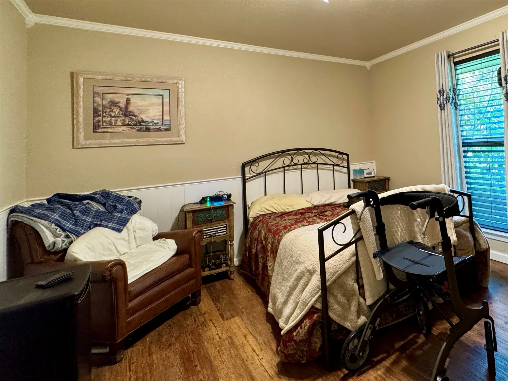 Guest room with large window.