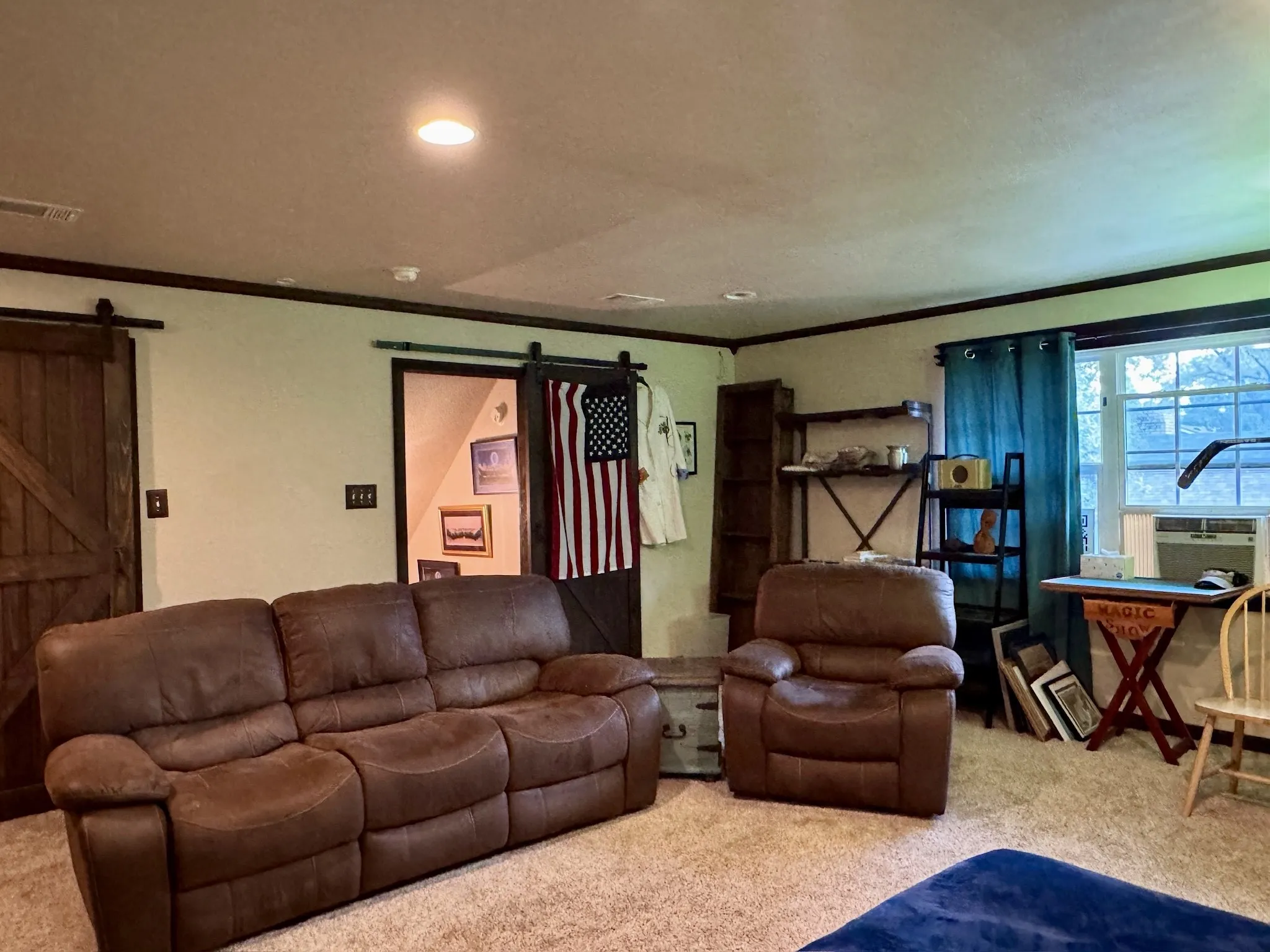 Upstairs is one big open room with two closets, ducted HVAC & a window unit to supplement as well.