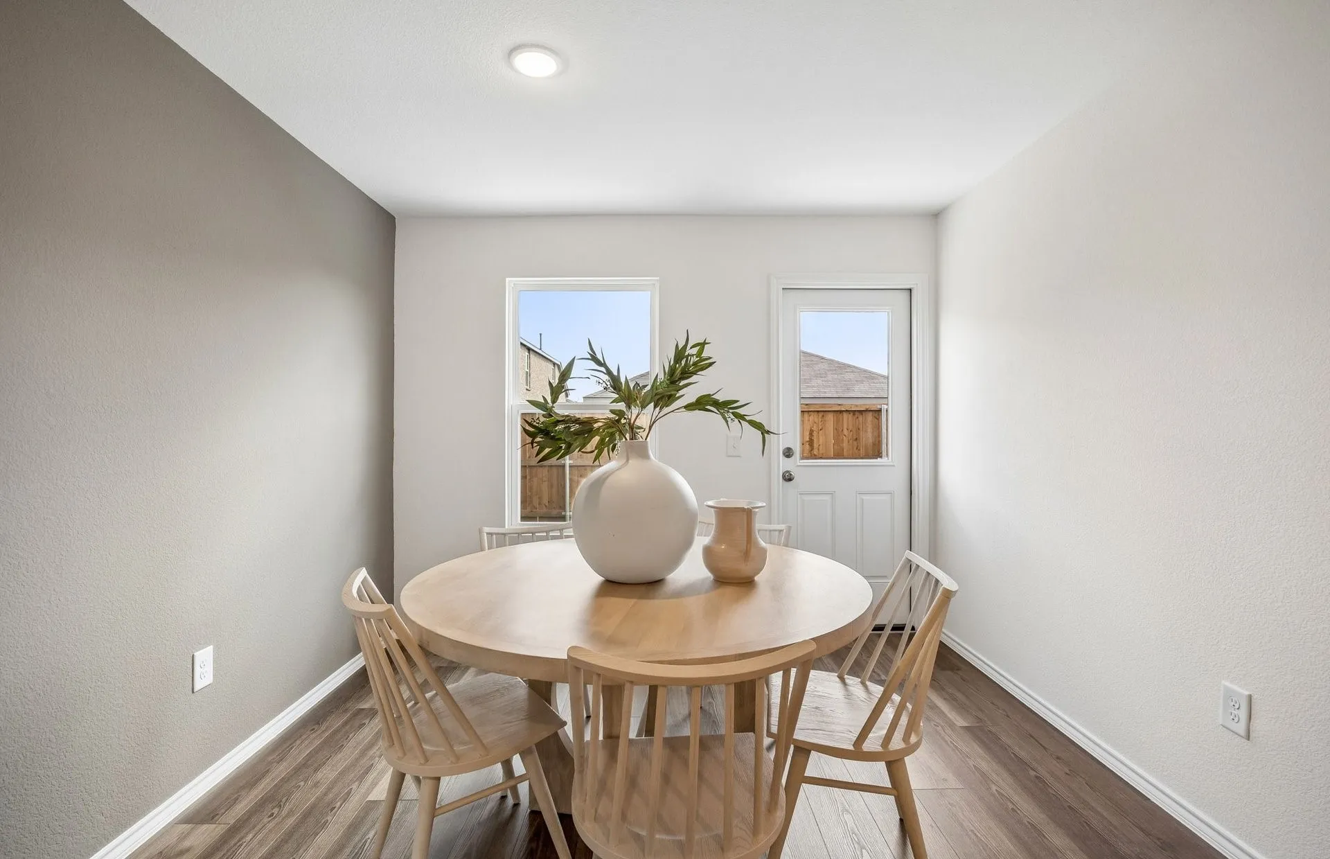 *Model Representation - Dining area off kitchen with large windows