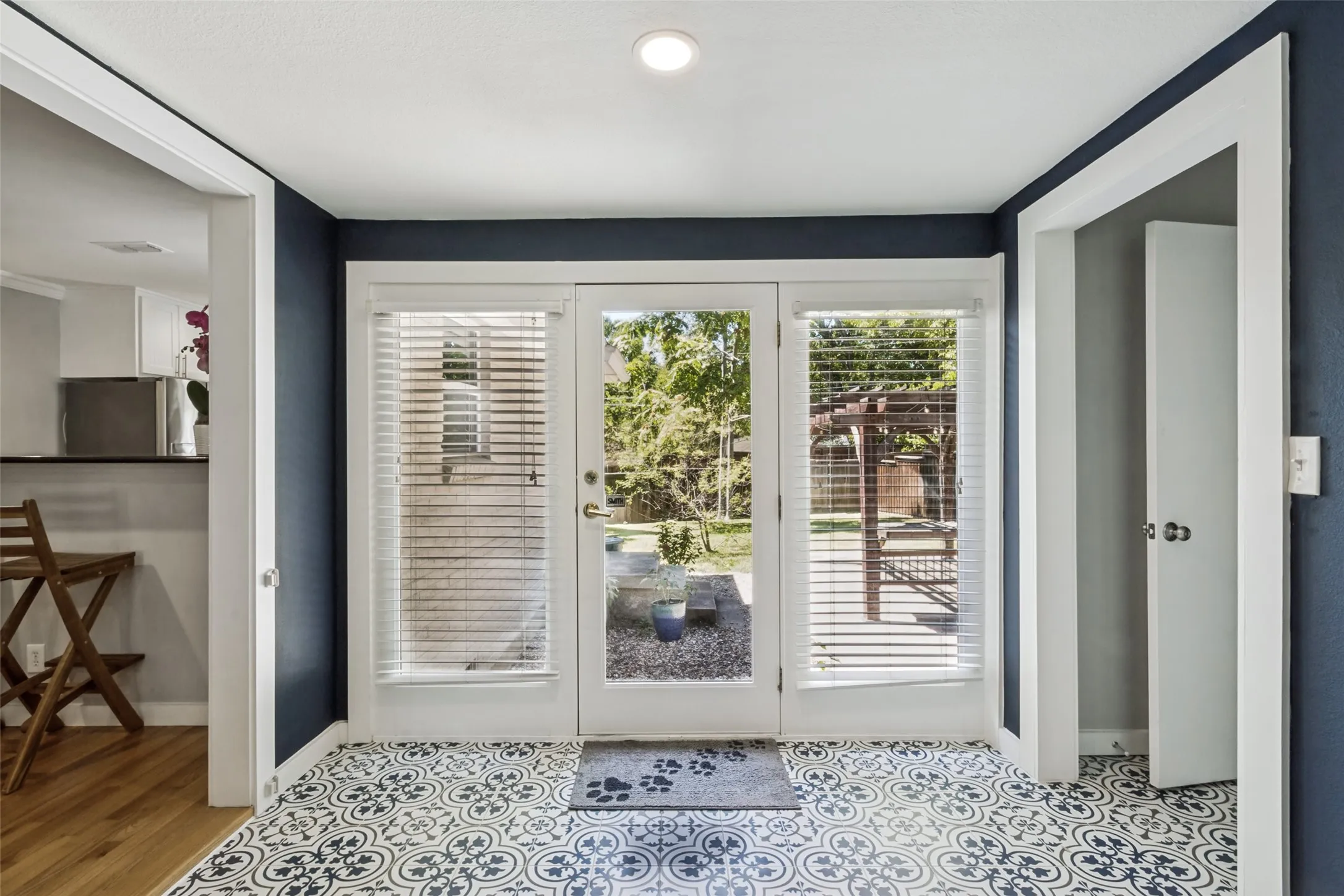 Beautiful sunroom with French doors to the patio