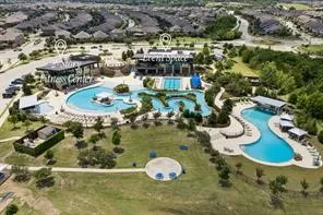 Community amenities featuring multiple swimming pools, a fitness center, and event spaces
