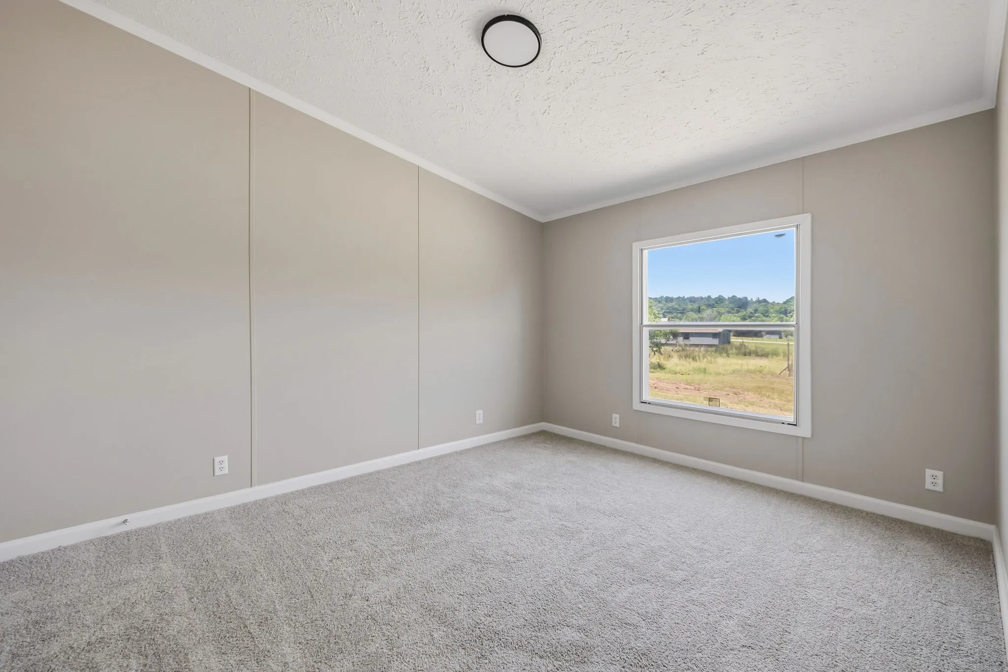 Neutral-toned walls with vertical paneling