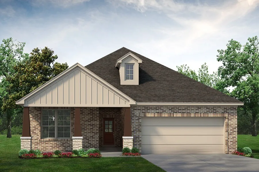 Brick facade with stone accents, covered entry, front-facing gable, and an attached garage with a paved driveway