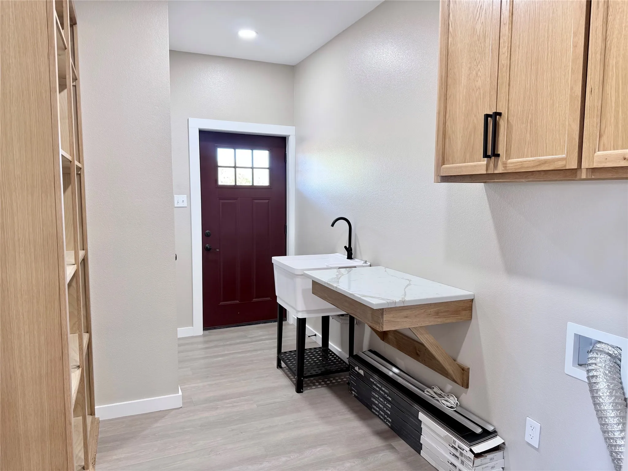Utility/mudroom.  Doors leads to carport