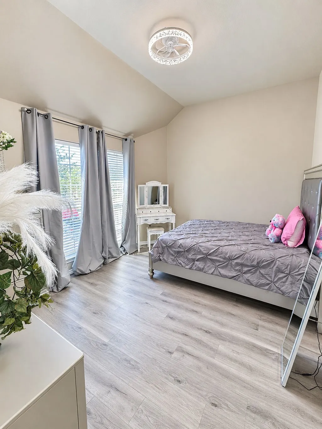 Light wood-finish flooring with neutral wall tones