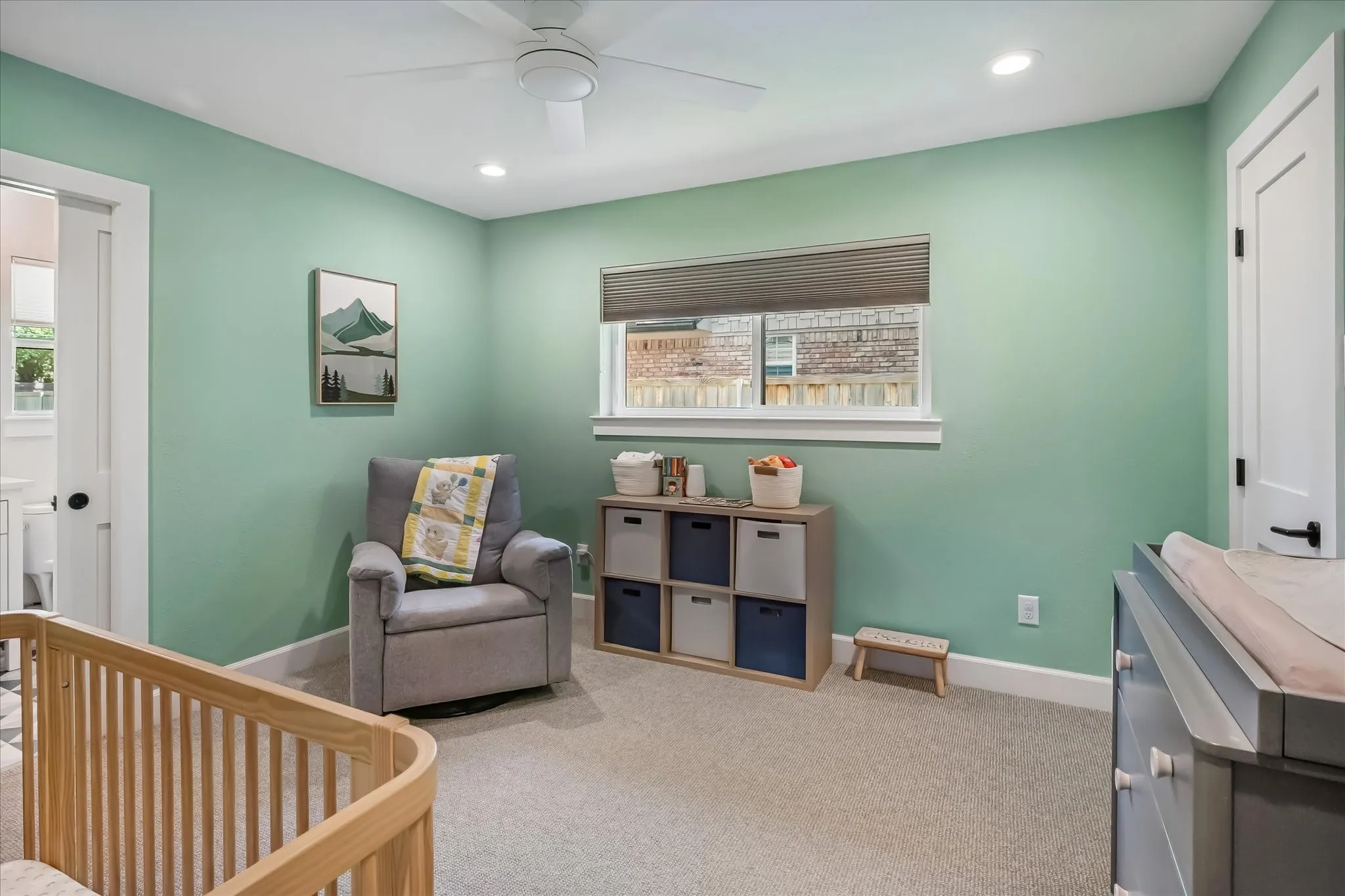 Carpeted bedroom featuring a ceiling fan, recessed lighting, and a single window with blinds