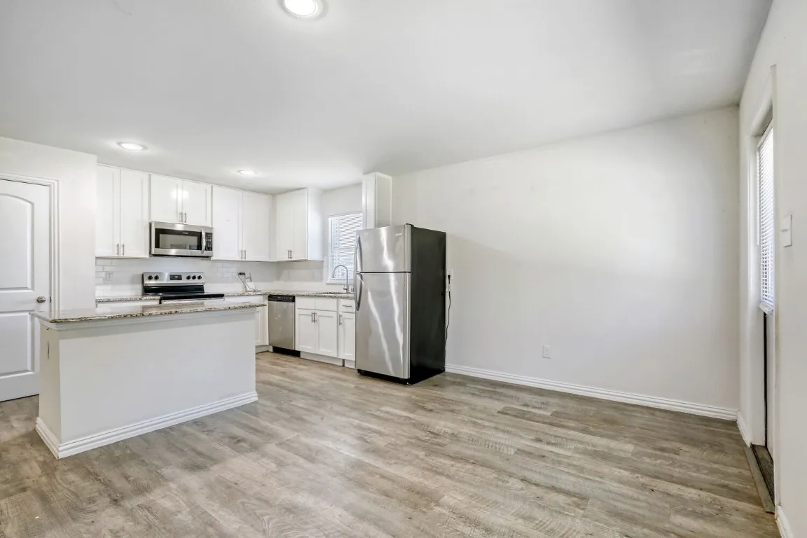 full appliance package, spacious area with island