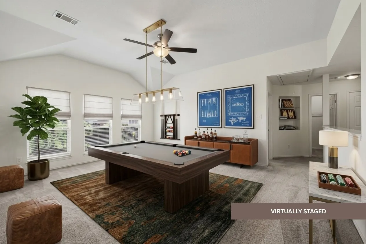Vaulted ceiling with a ceiling fan, multiple windows with blinds, built-in shelving, recessed lighting, and carpeted flooring