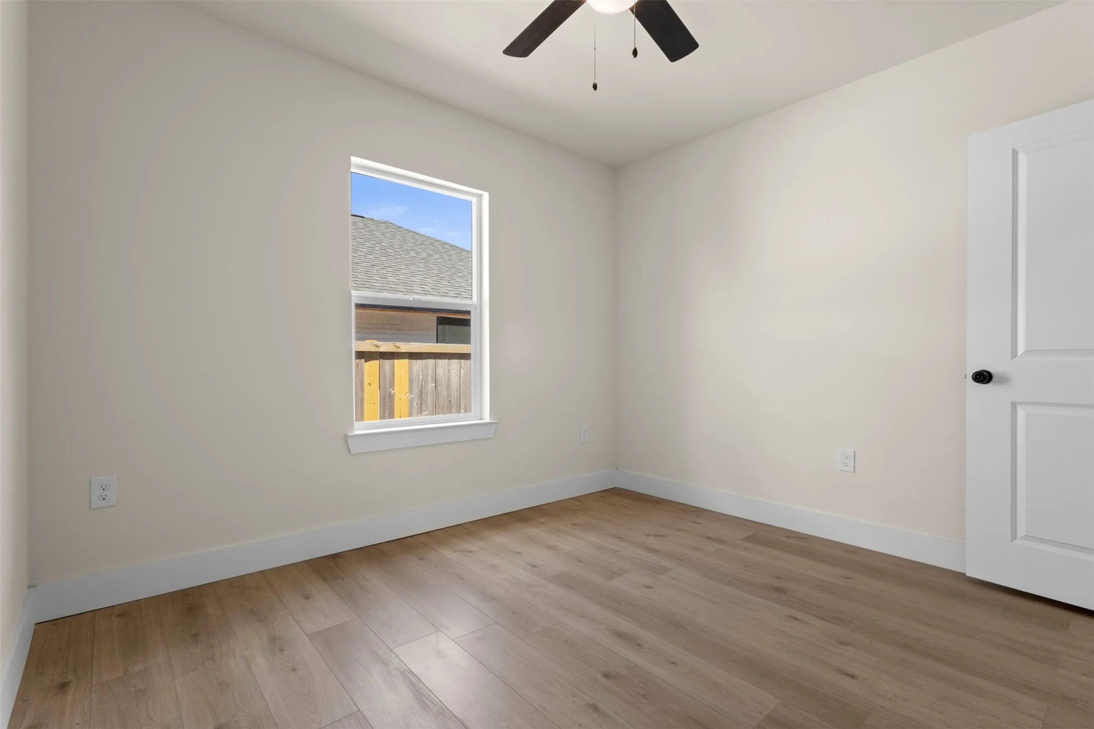 Wood-finish flooring with white trim