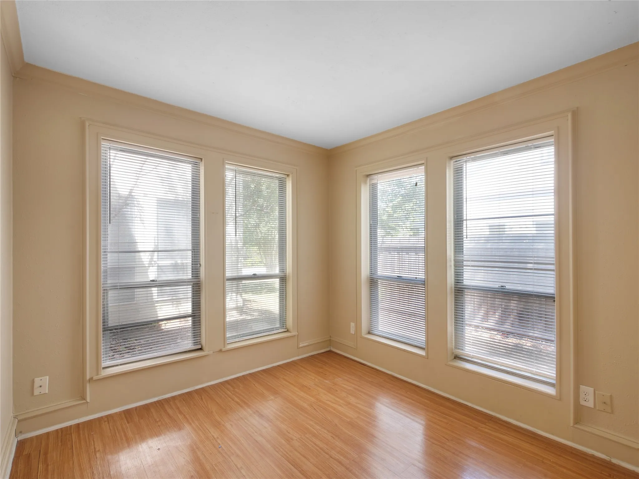 Wood-finish flooring with a neutral wall palette