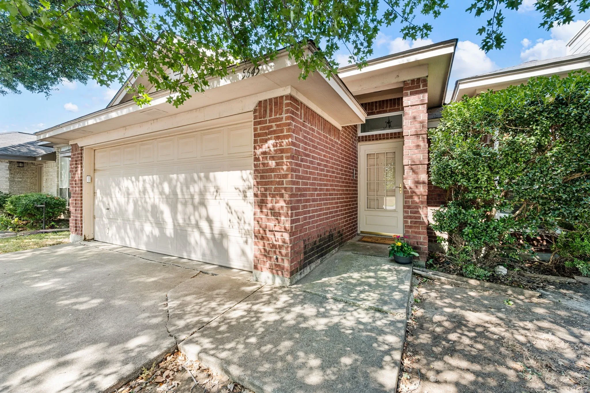 Covered entry offers a warm welcome into this lovely home.