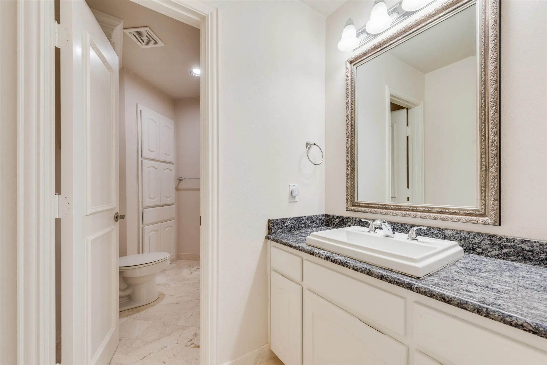 JACK AND JILL 2ND FLOOR TRAVERTINE FLOORS AND SHOWER