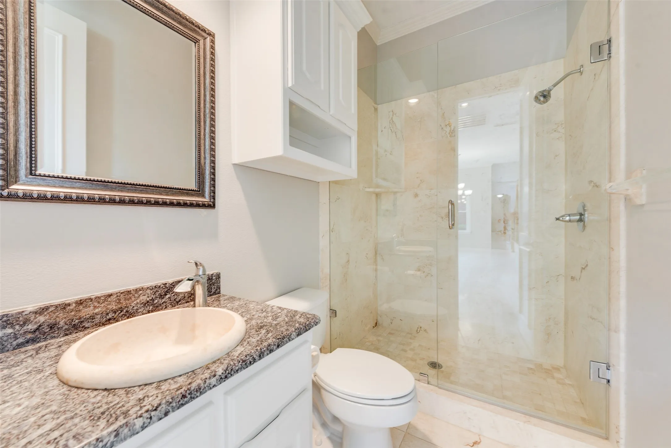 1ST FLOOR TRAVERTINE FLOOR AND SHOWER