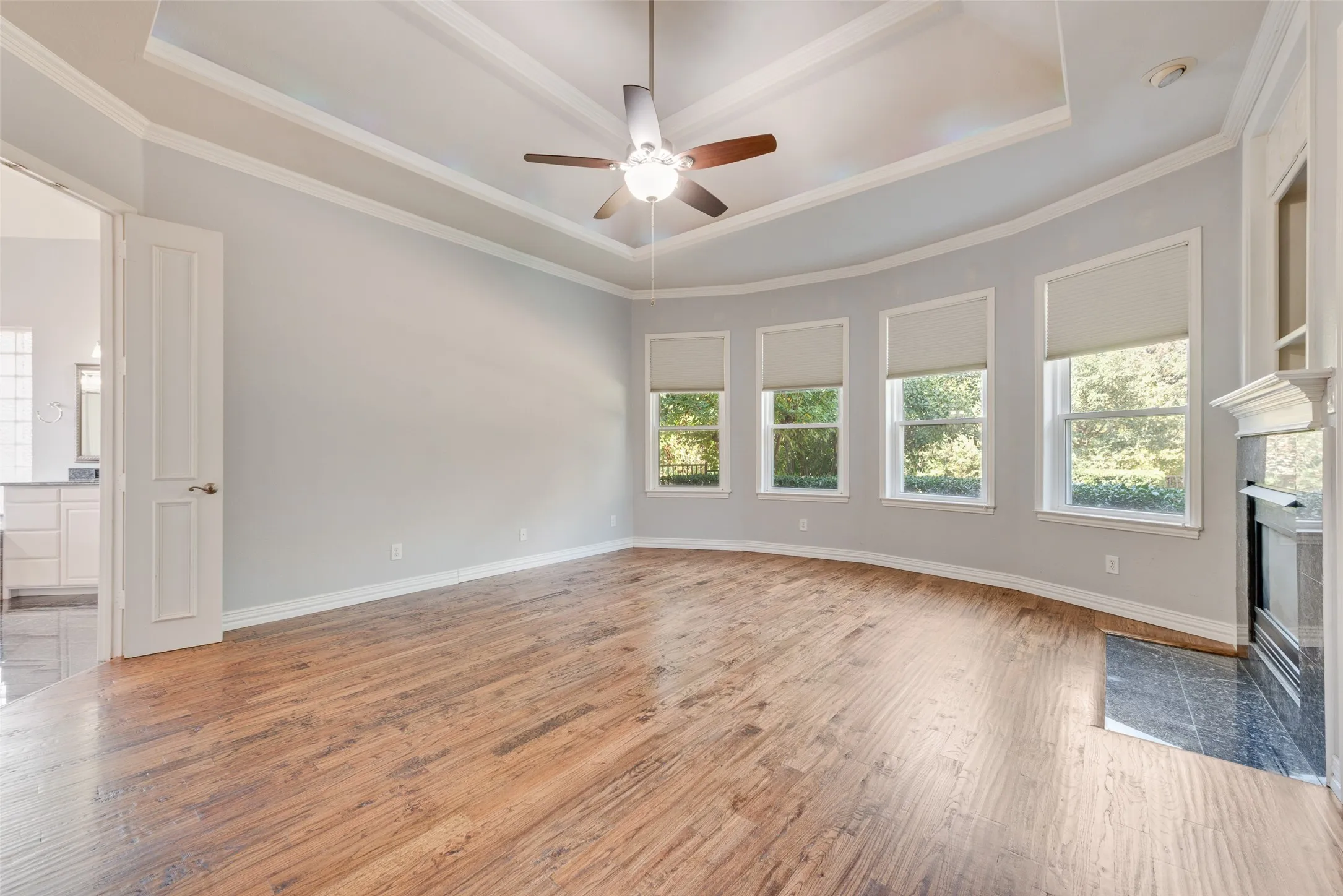 FEATURES FIREPLACE AND VIEWS OF BACK GARDEN