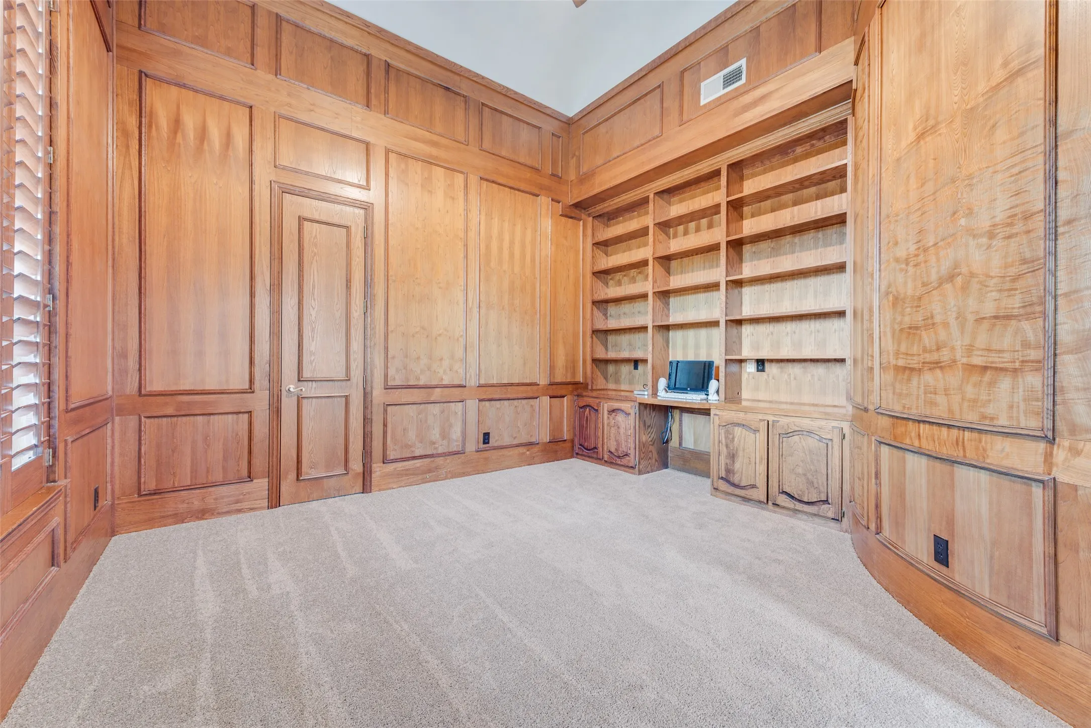VAULTED CEILING AND BEAUTIFUL OAK PANELING