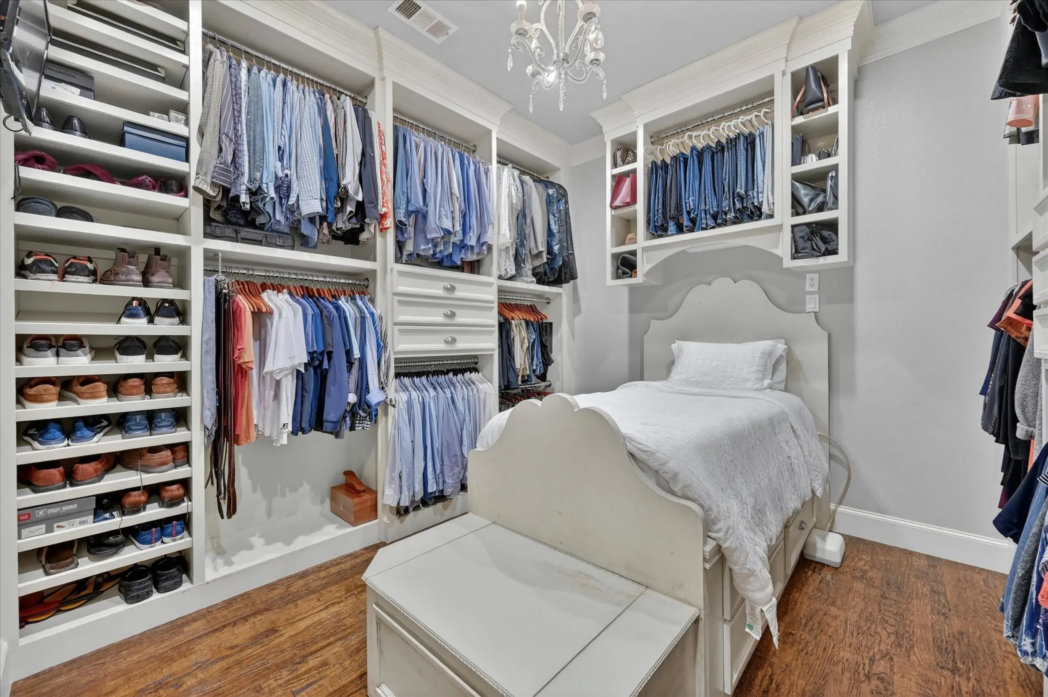 Huge primary closet with a custom closet system.