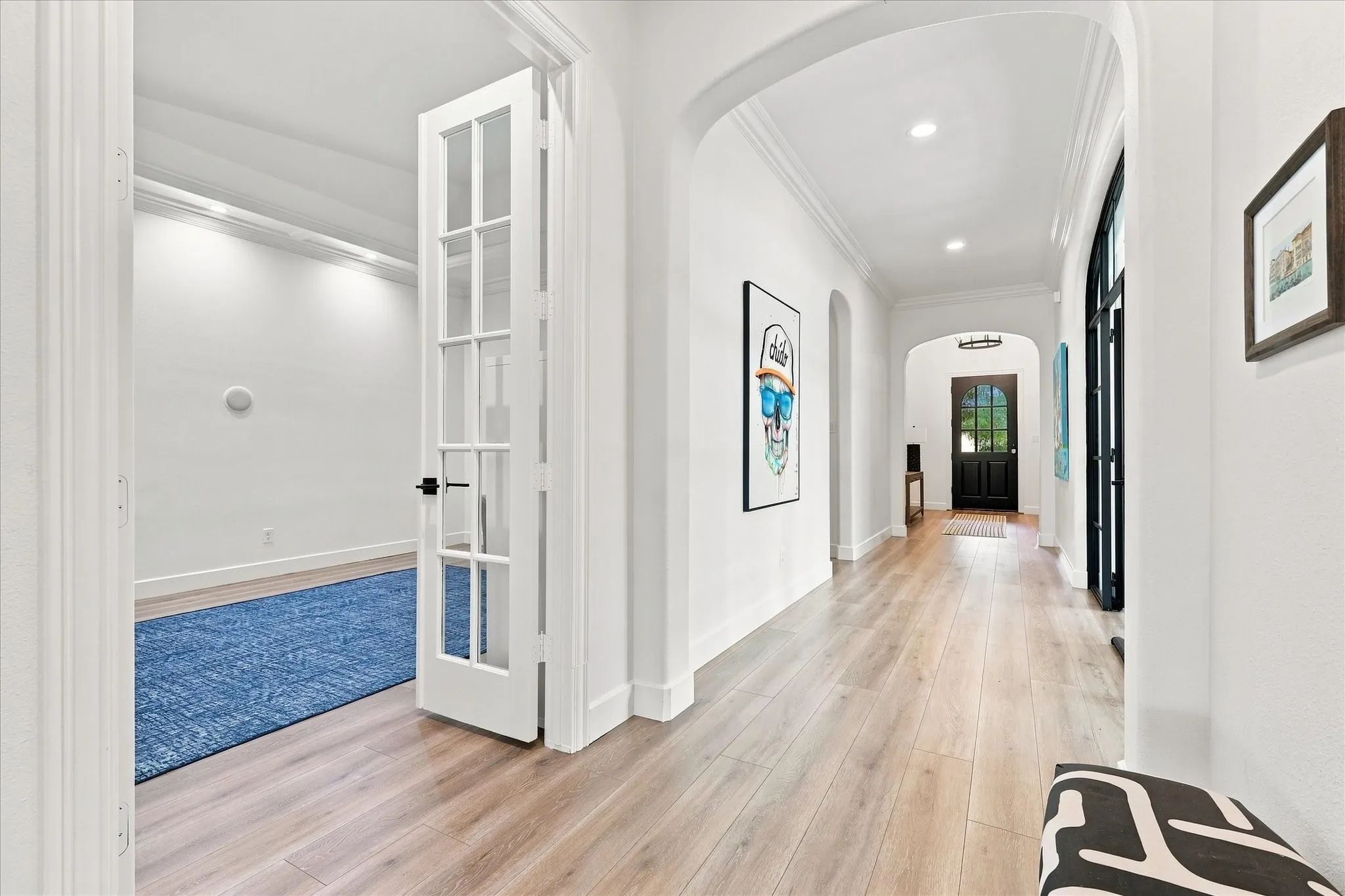 Foyer with Media Room on left and Office on right