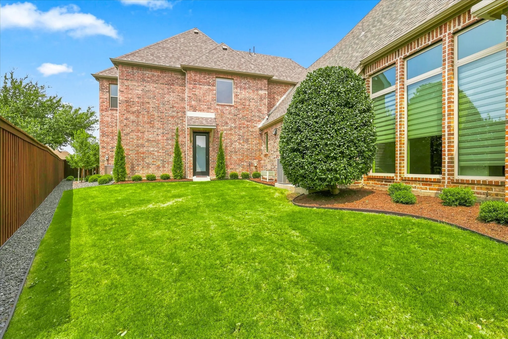 Separate side yard is ideal for a pet run.