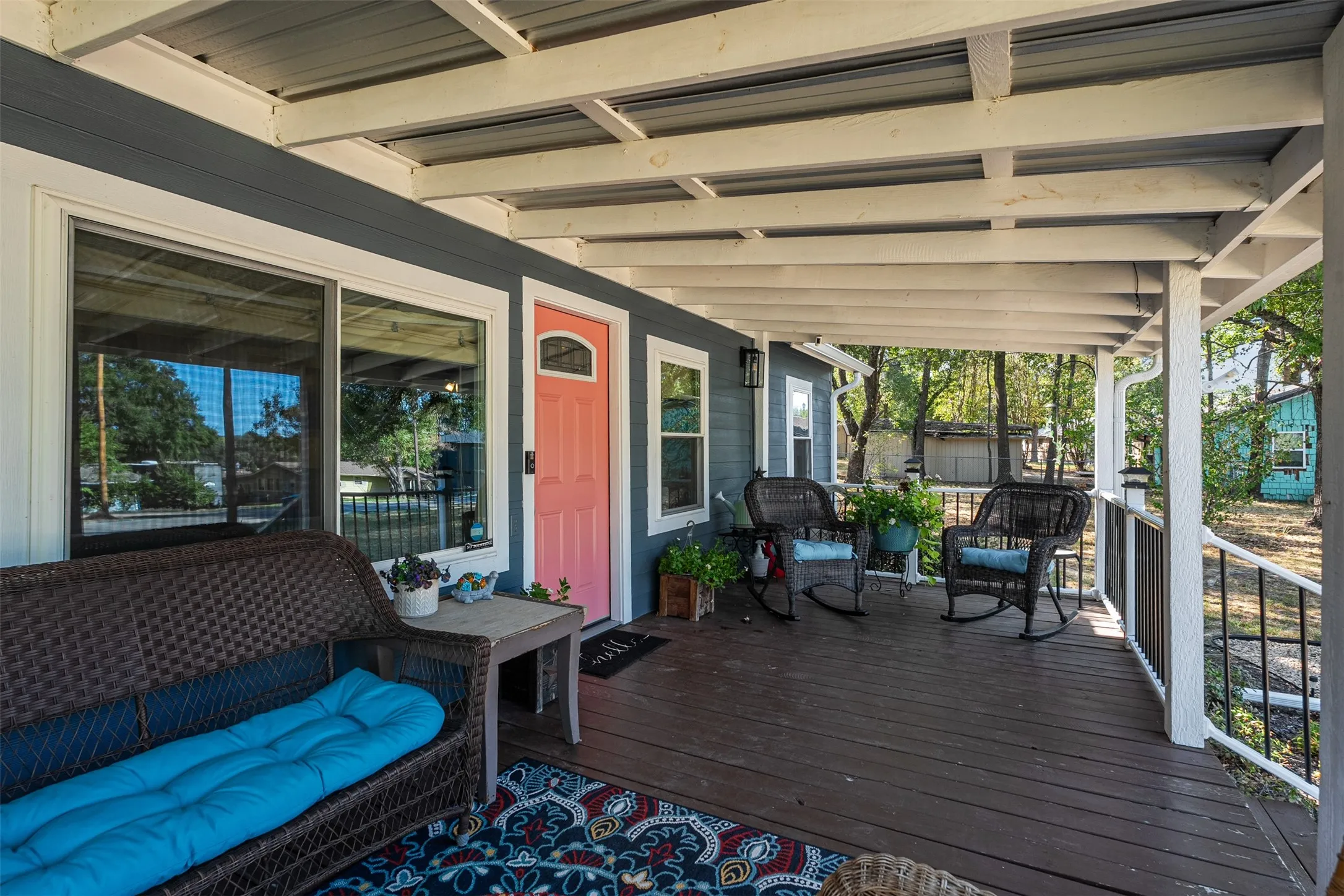 Great covered front porch with lake views