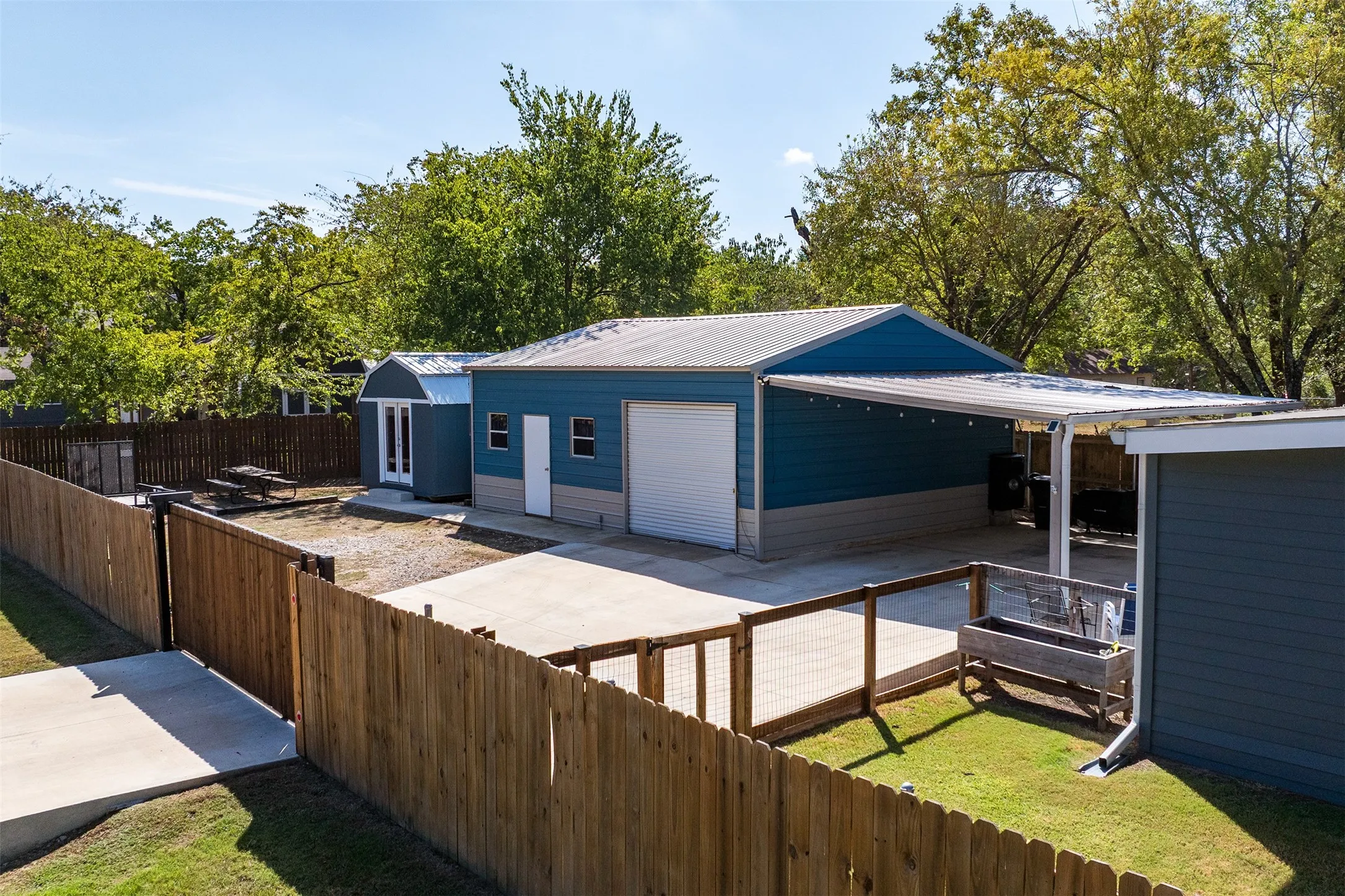 Six-foot fence with power gate