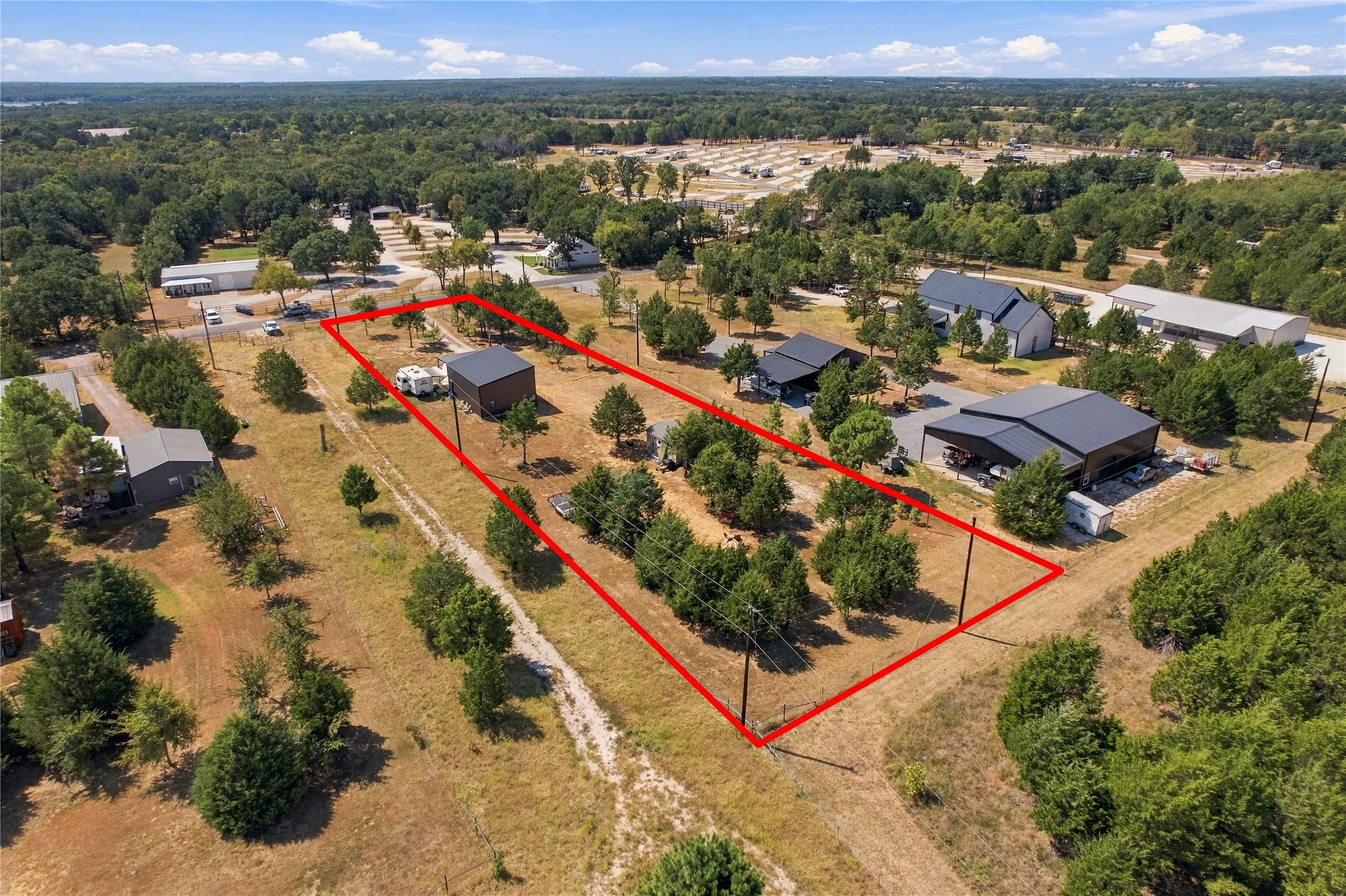 Spacious lot with established trees and a detached structure