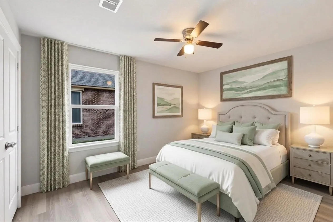 The versatile secondary bedroom can easily function as a guest room, home office, hobby space, or additional flex room to fit your lifestyle needs. Virtually staged to show possible furniture placement.