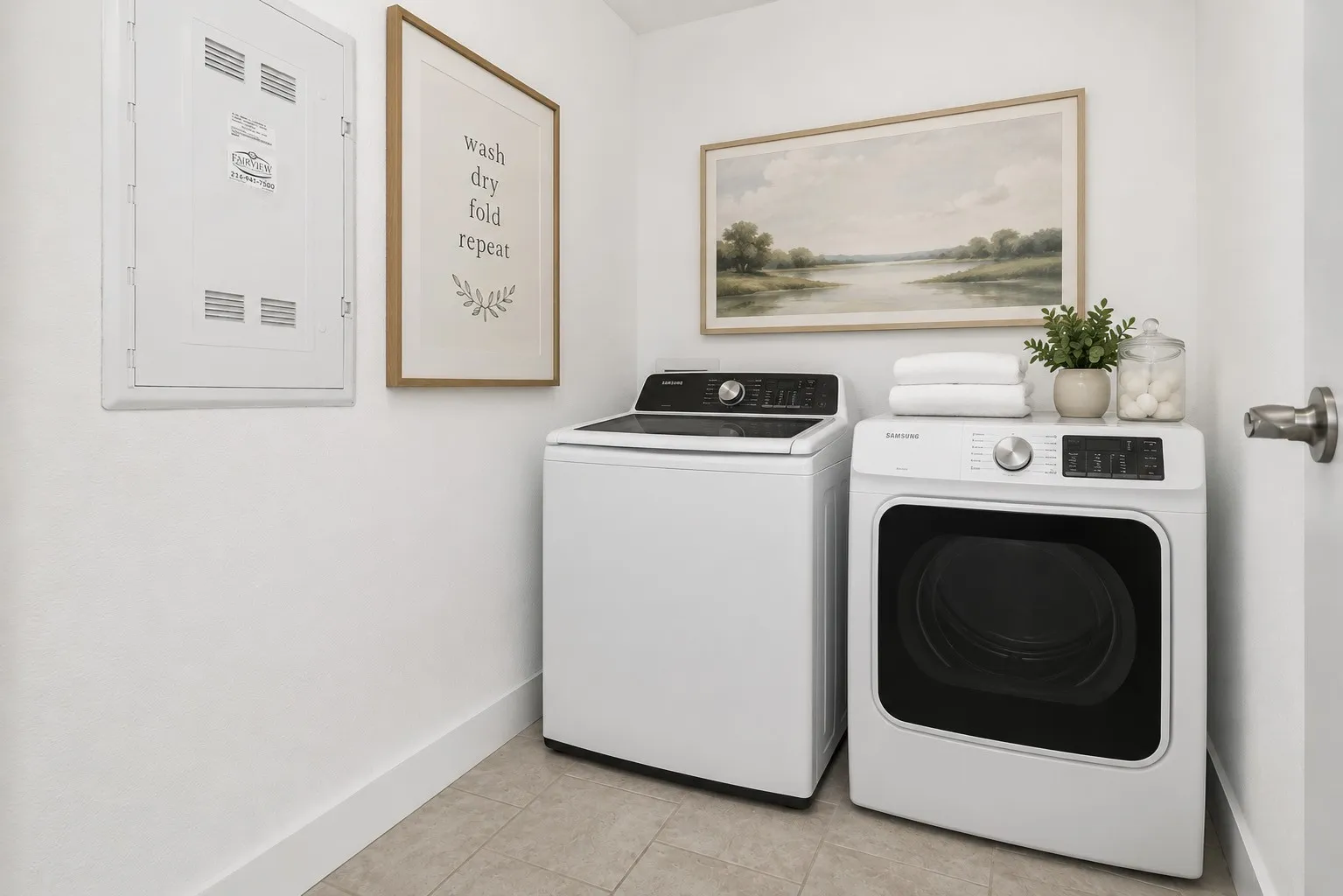 The dedicated laundry room offers space for a full-size washer and dryer, adding everyday convenience and functionality. Virtually staged to show furniture placement.