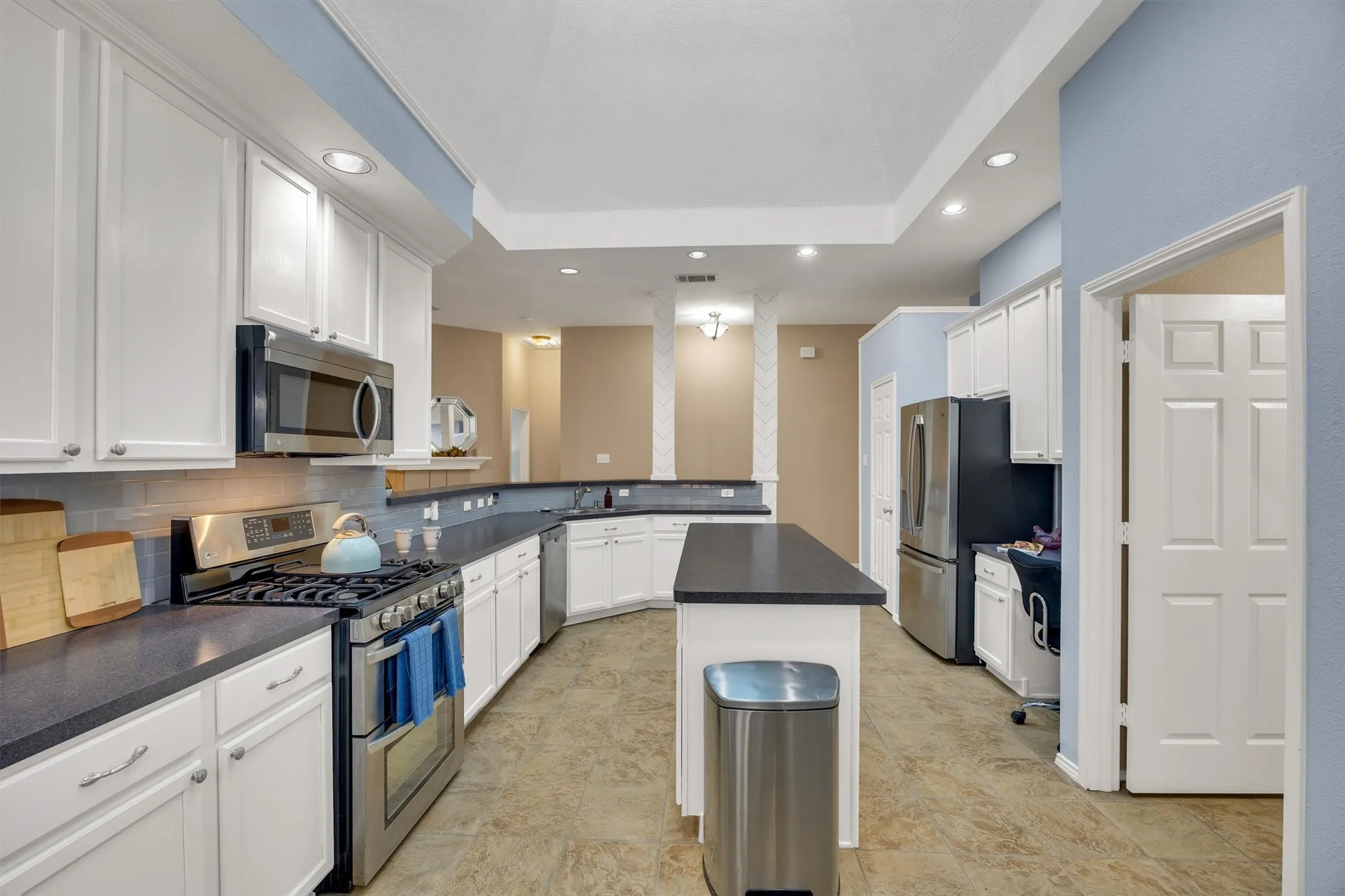 Open kitchen complete with skylight and breakfast room