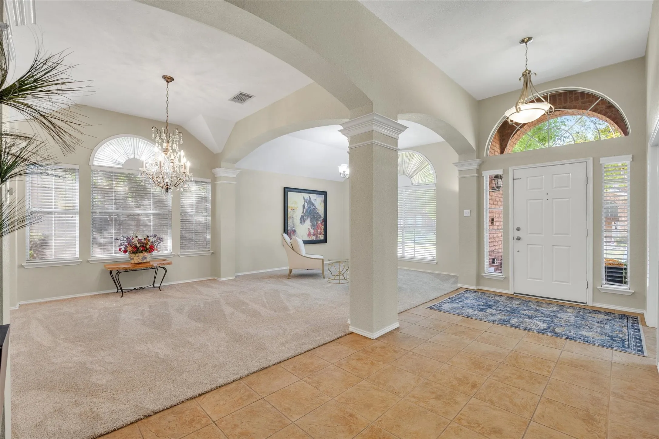 open space front entry to den, dining and front flex bedroom/ office