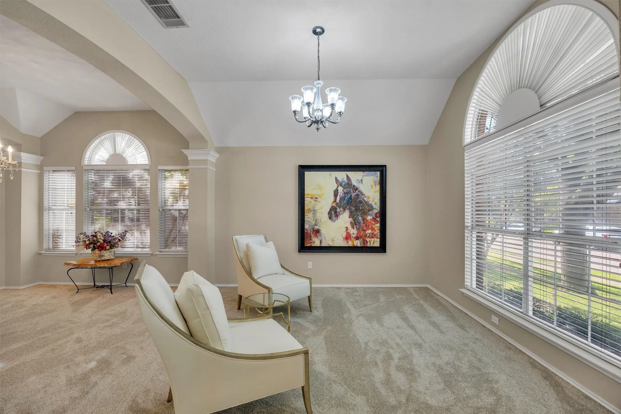 open space front entry to den, dining and front flex bedroom/ office