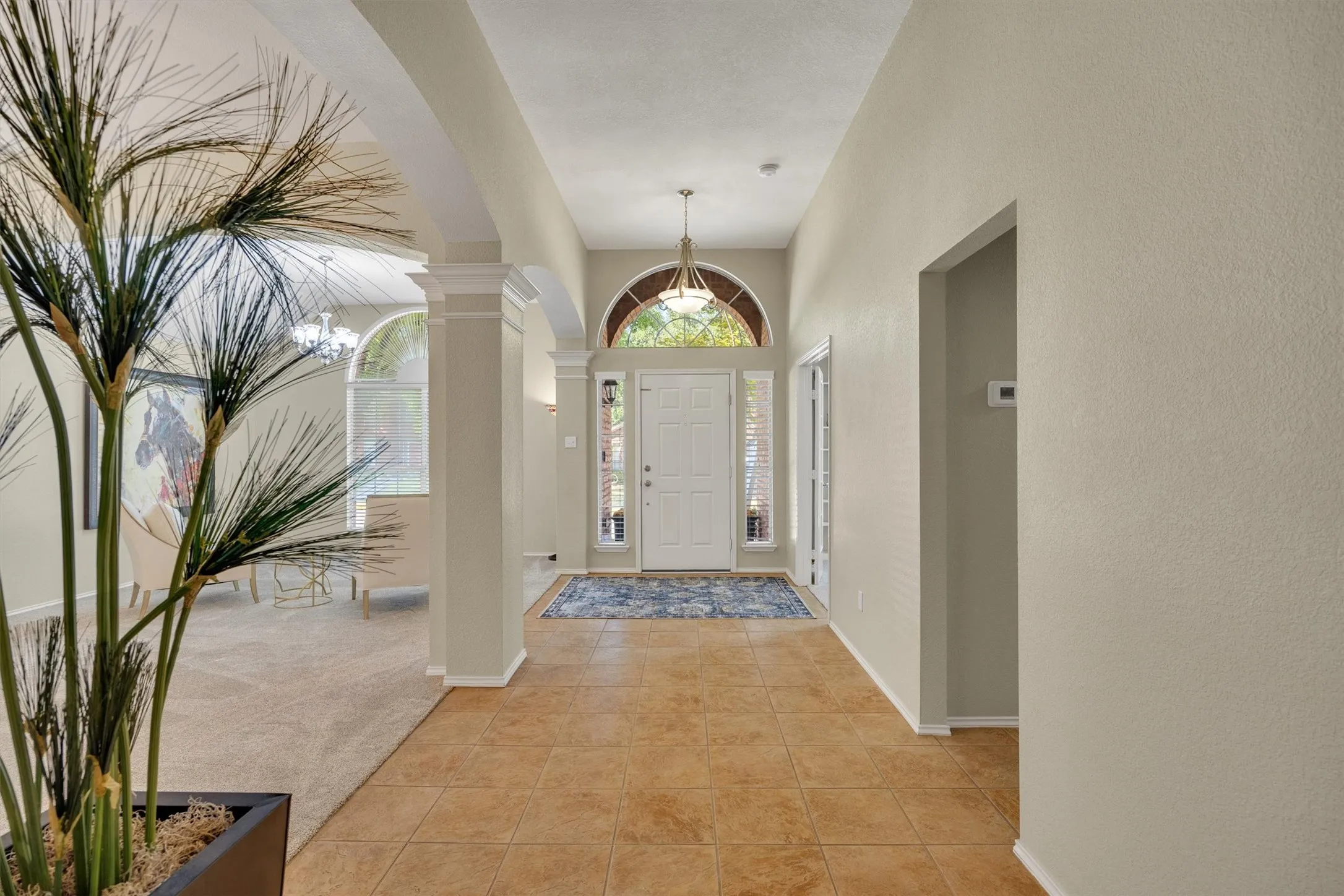 open space front entry to den, dining and front flex bedroom/ office