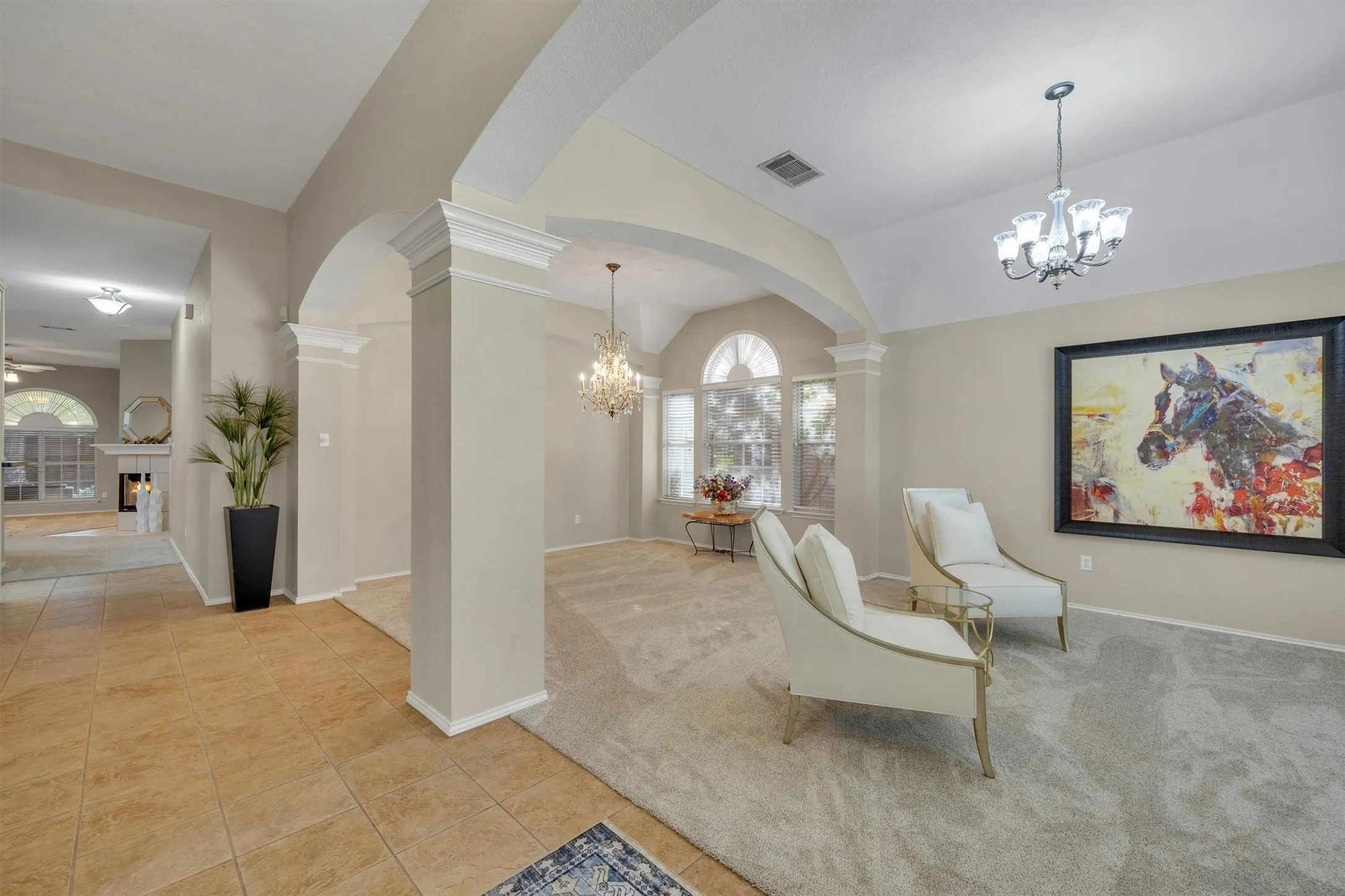 open space front entry to den, dining and front flex bedroom/ office