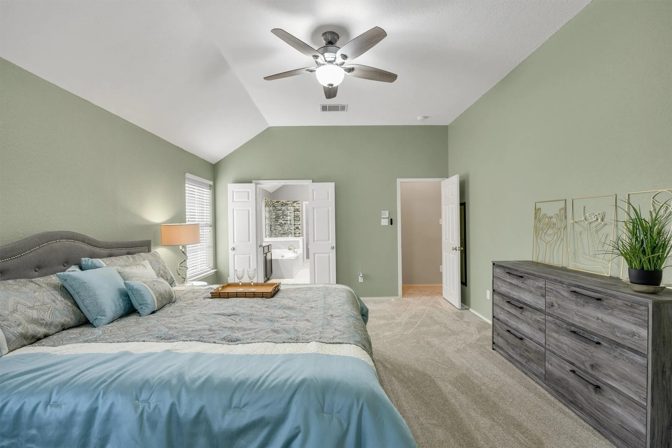 Primary bedroom with sitting area