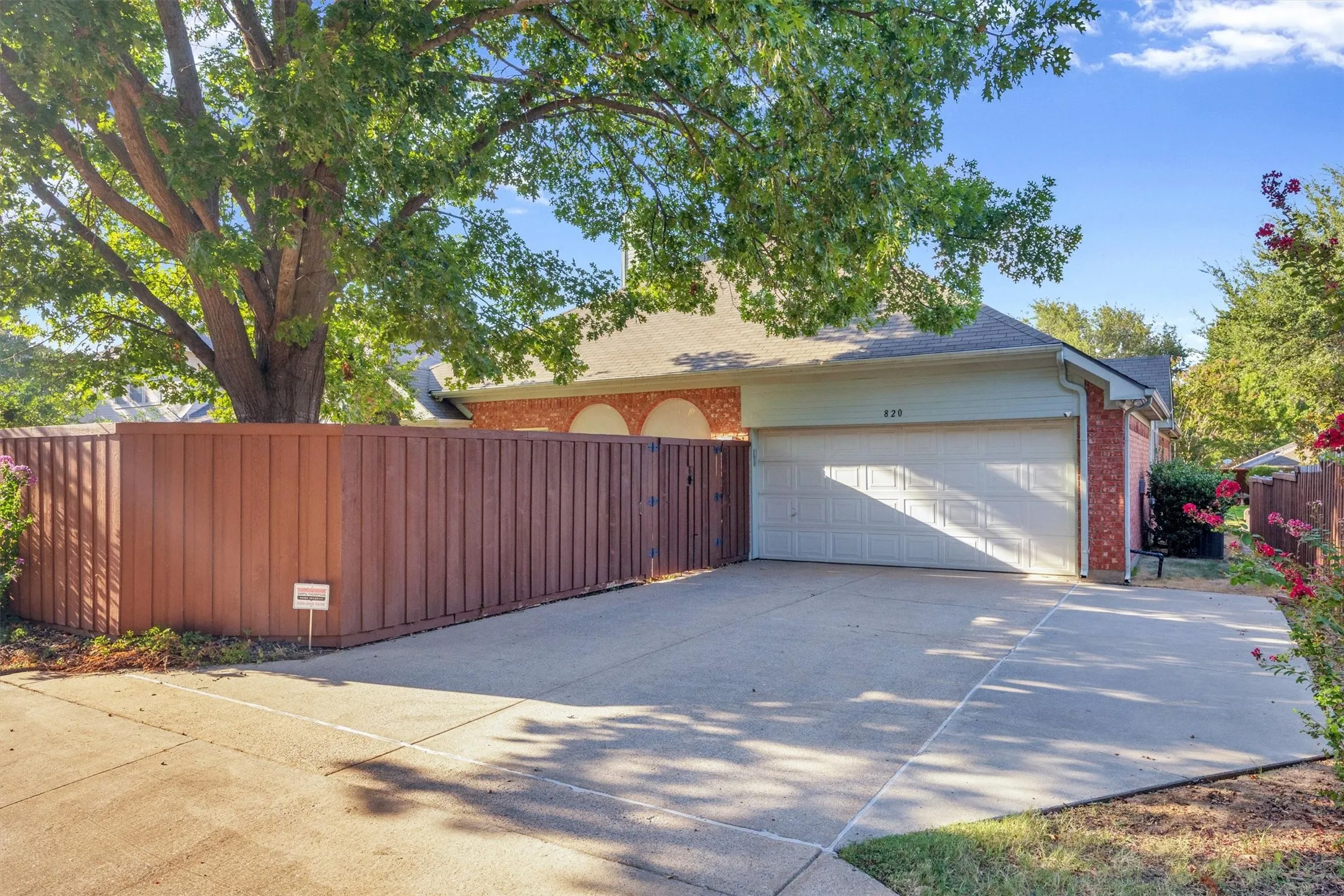 Rear entry oversized driveway to your two car garage