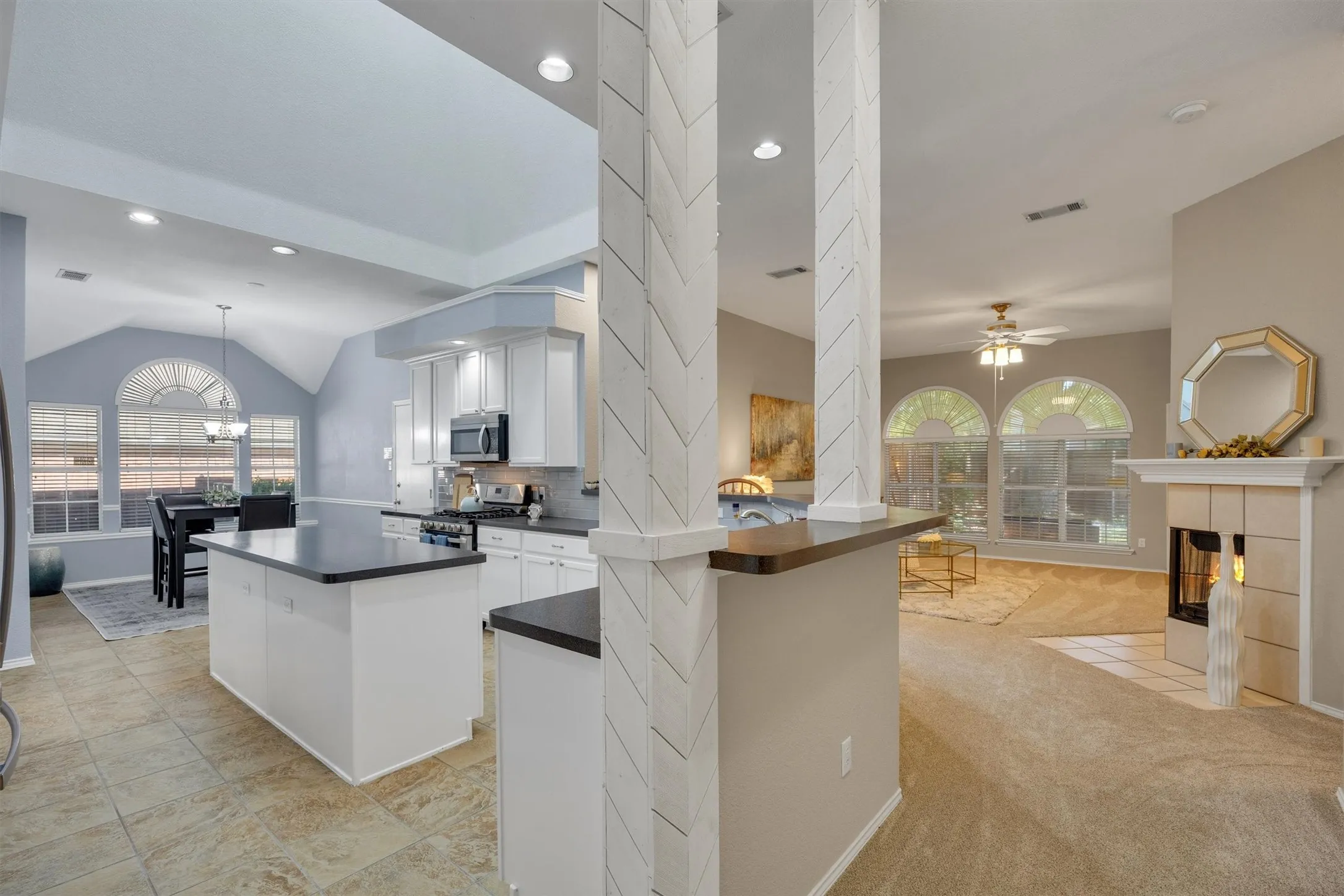 Open kitchen complete with skylight and breakfast room