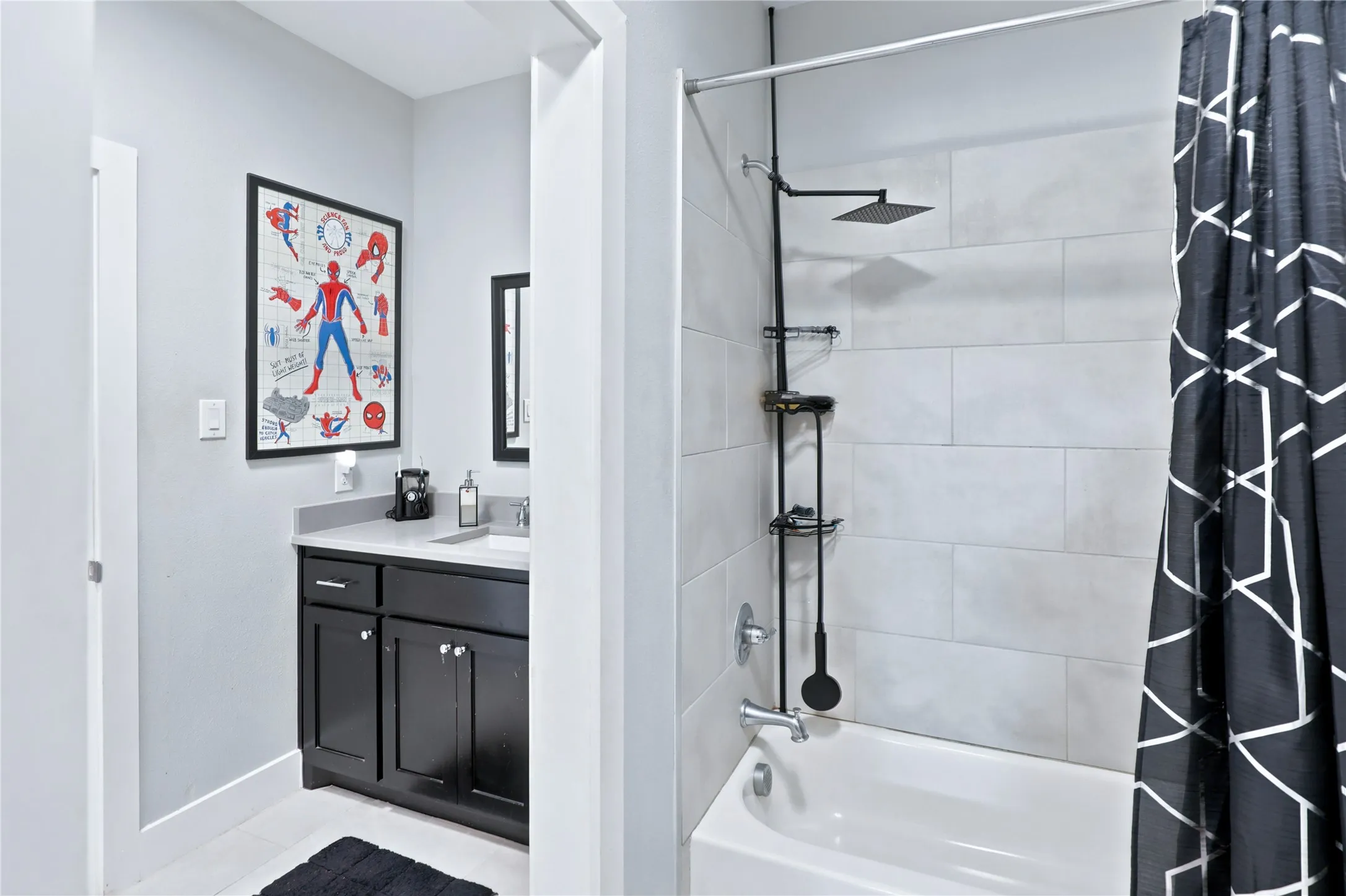 White subway tile shower surround with a matte black rainfall showerhead