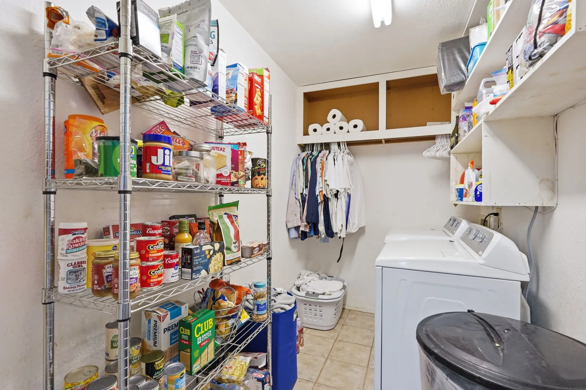 Utility room featuring tile flooring