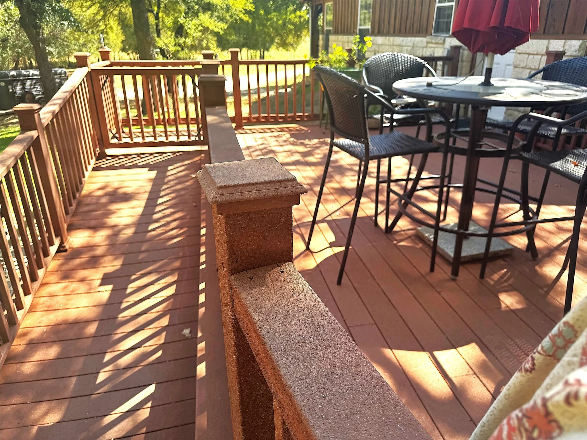 ENTRY RAMP WITH GATE AT TOP ENTRY TO DECK ON NW SIDE OF HOME