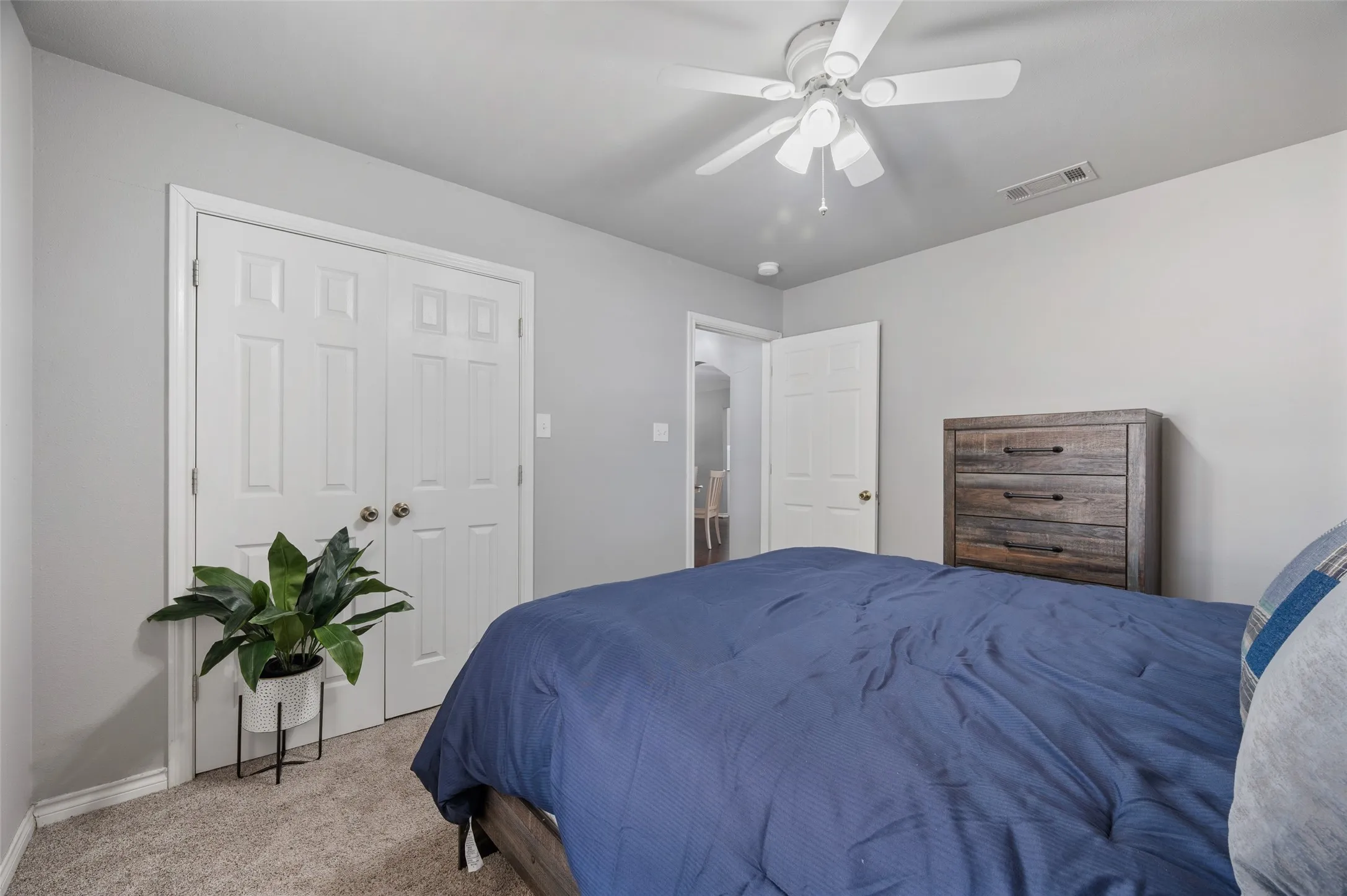 Second bedroom has neutral colors to accommodate any decor.