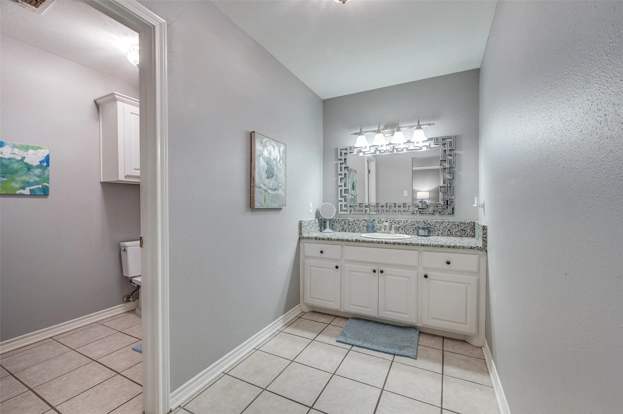 Primary bathroom has a separate room with the toilet and tub/shower for added privacy and efficiency while getting ready for work, school, or whatever the day brings you.