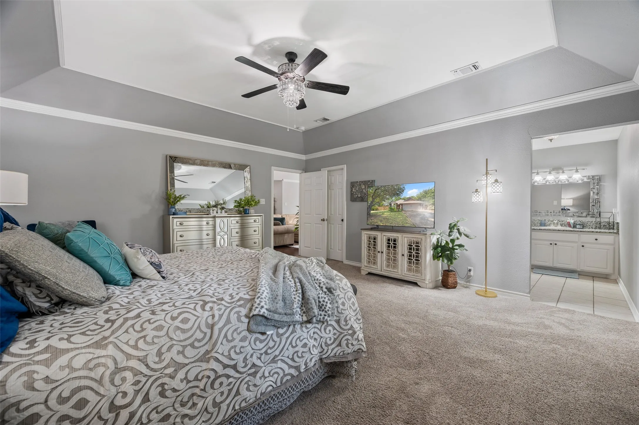 Primary bedroom is separate from the other two bedrooms and has open access to it's own ensuite bath!