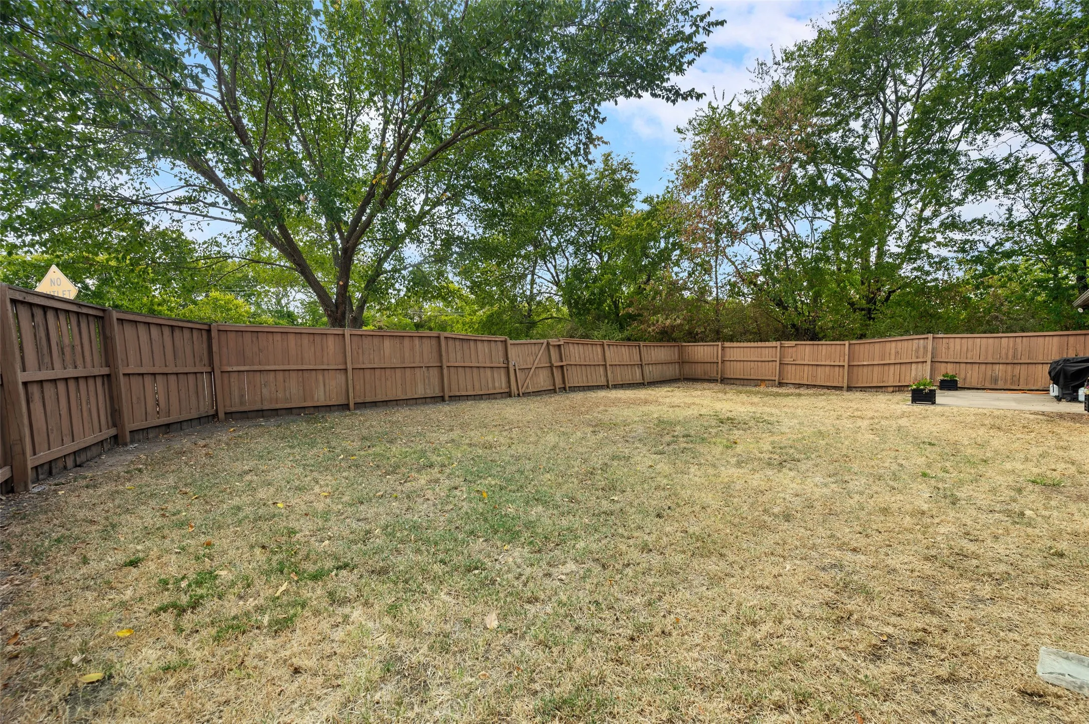 Enjoy your fully fenced in corner lot backyard!