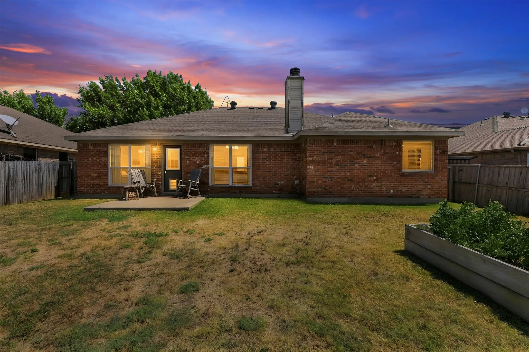 Huge backyard with patio and garden boxes