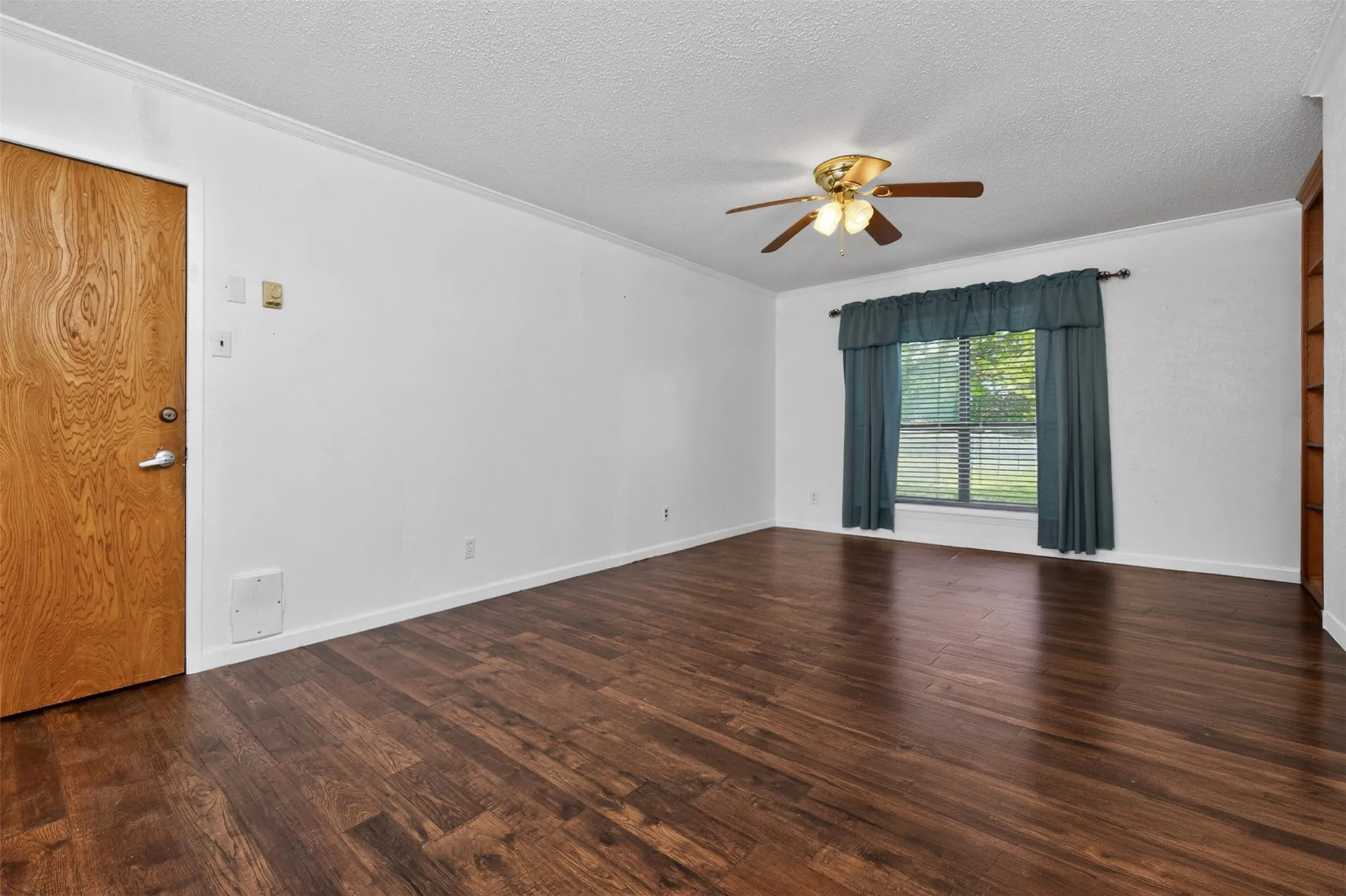Large room off the kitchen can be used as an office, second living room, media room - you decide!